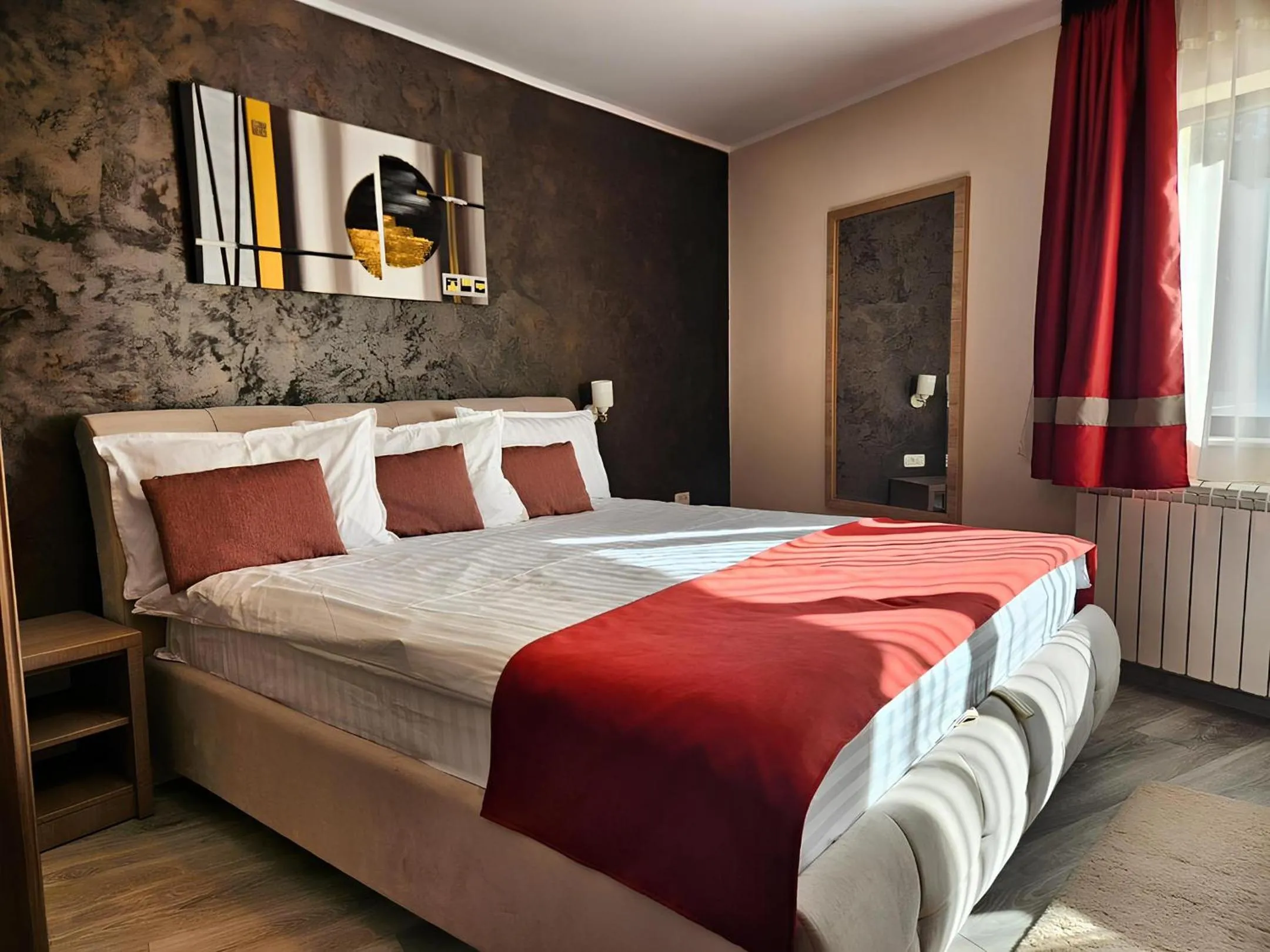 Bed in Pensiunea Andrei Moieciu