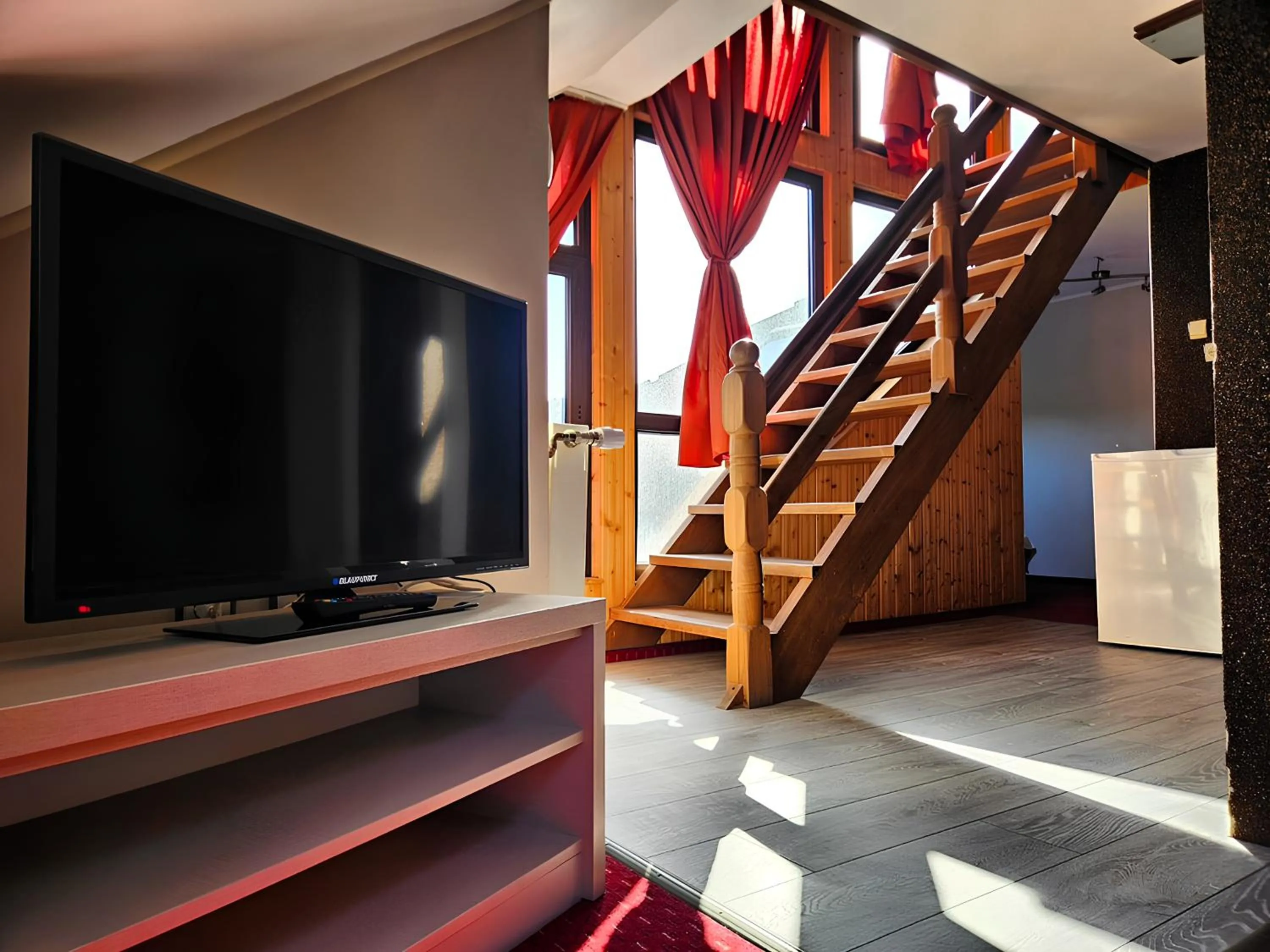Communal lounge/ TV room in Pensiunea Andrei Moieciu