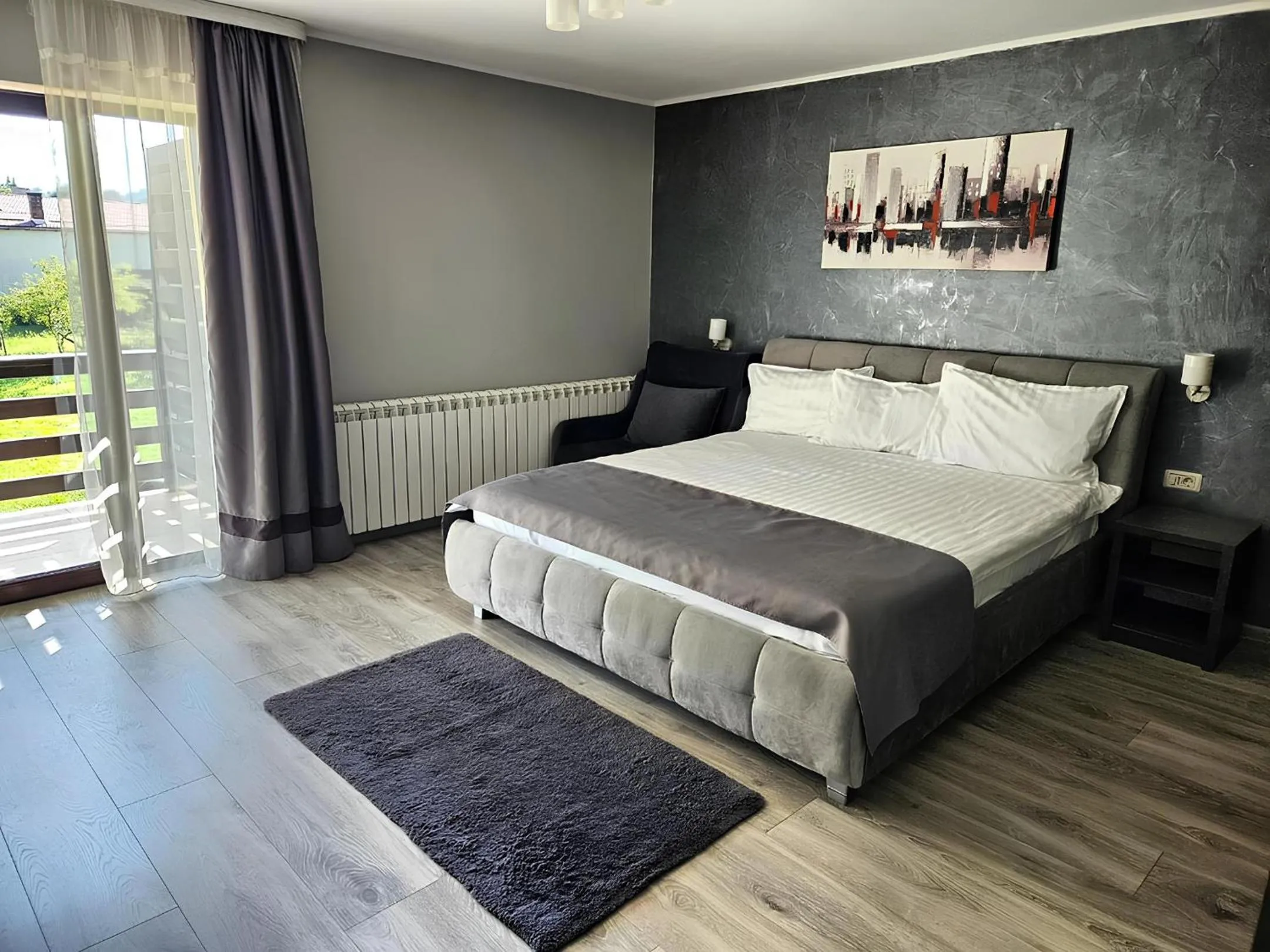 Bed in Pensiunea Andrei Moieciu