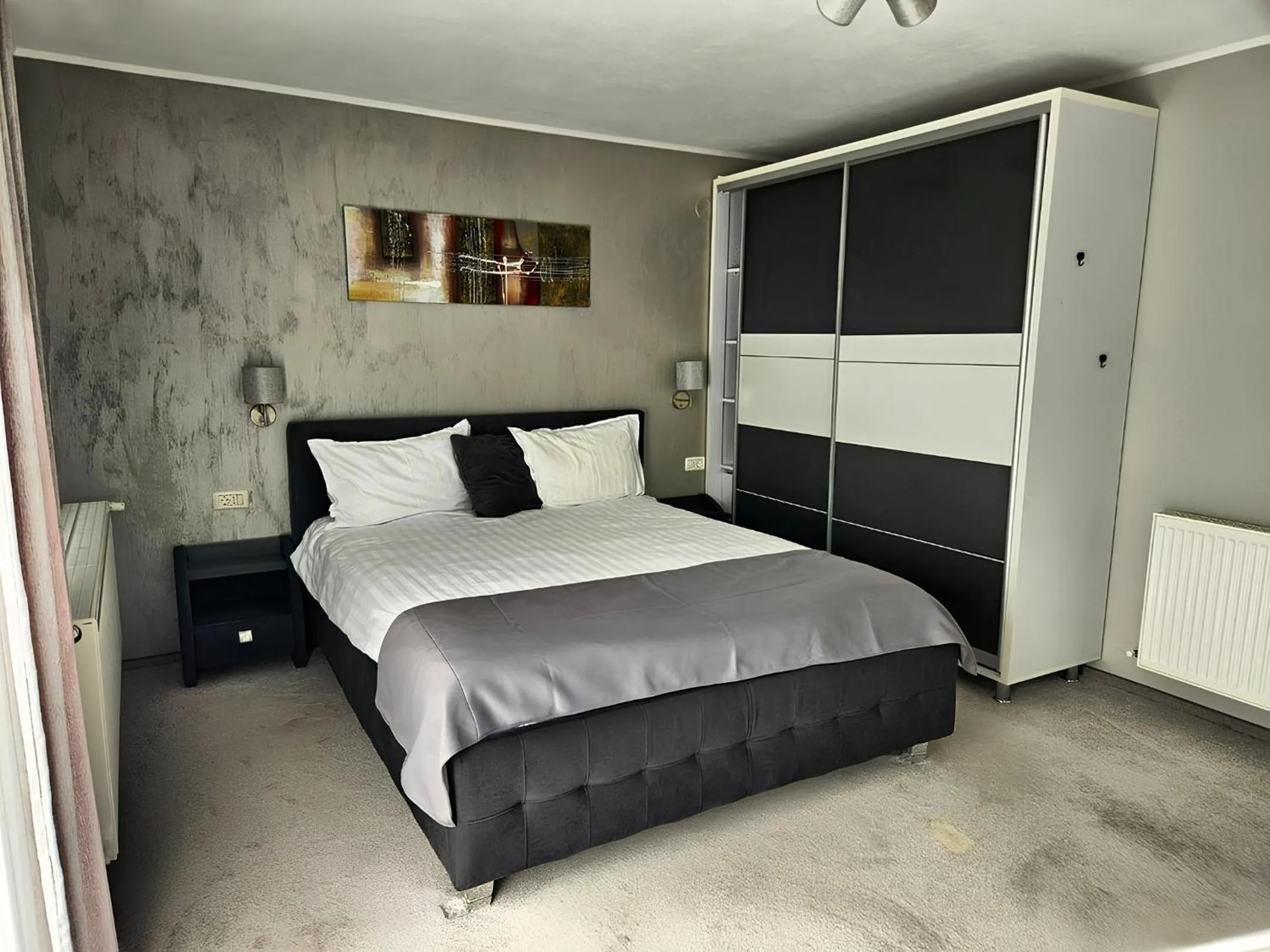 Bed in Pensiunea Andrei Moieciu