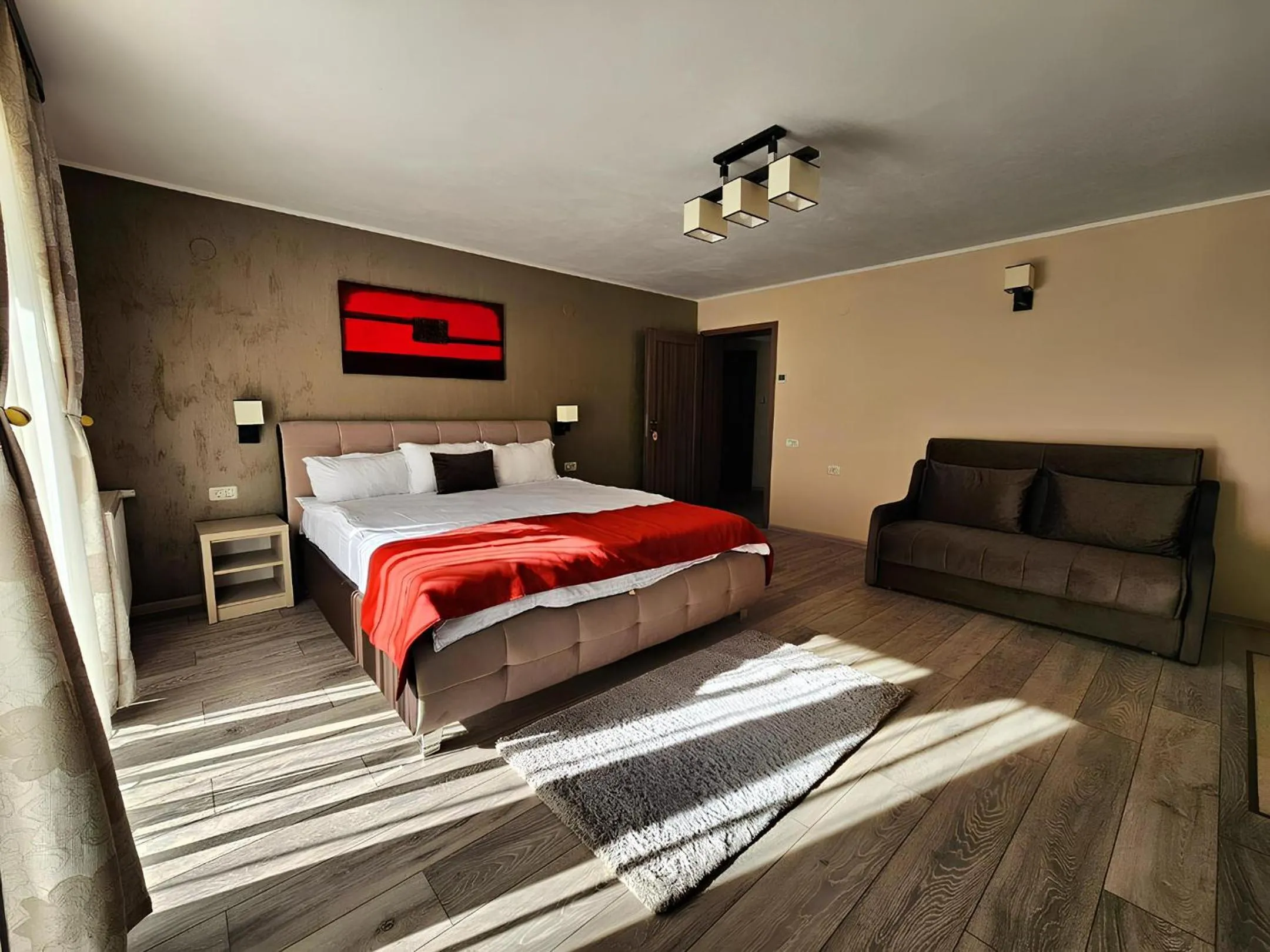 Bed in Pensiunea Andrei Moieciu
