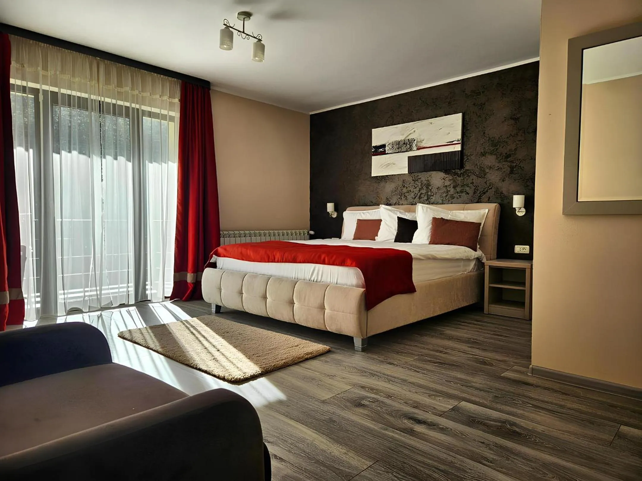 Bed in Pensiunea Andrei Moieciu