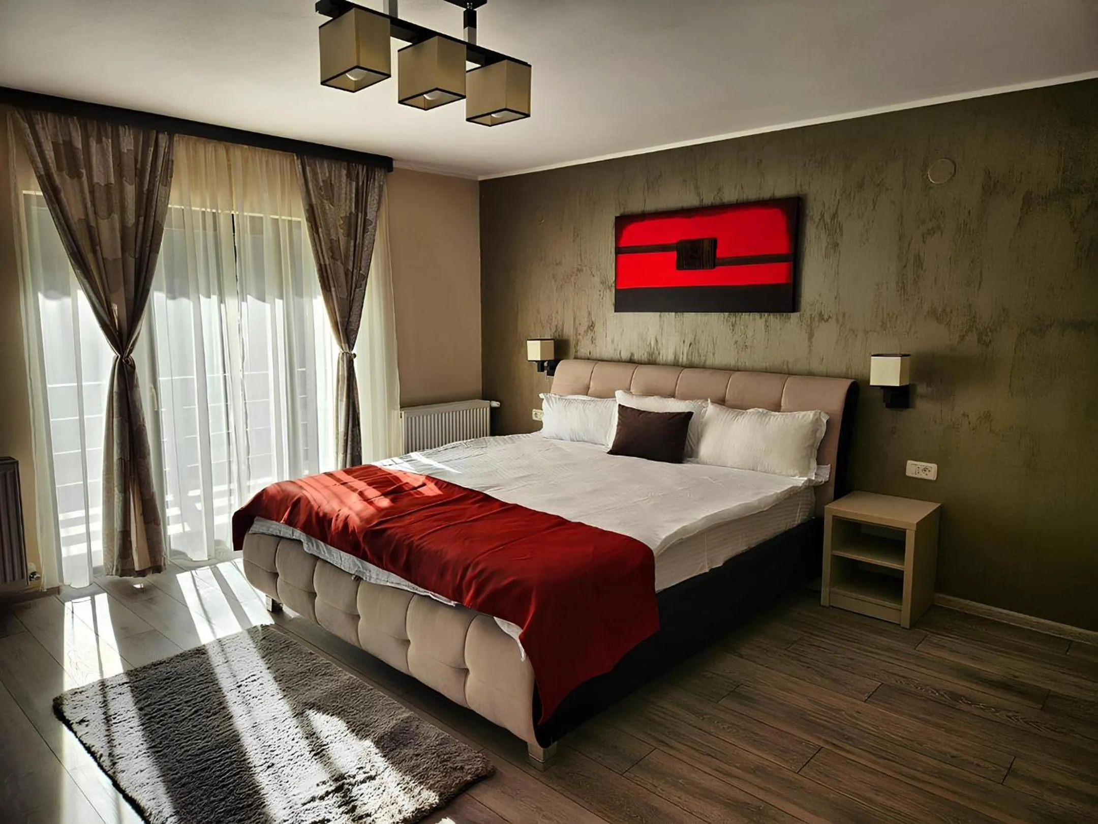 Bed in Pensiunea Andrei Moieciu
