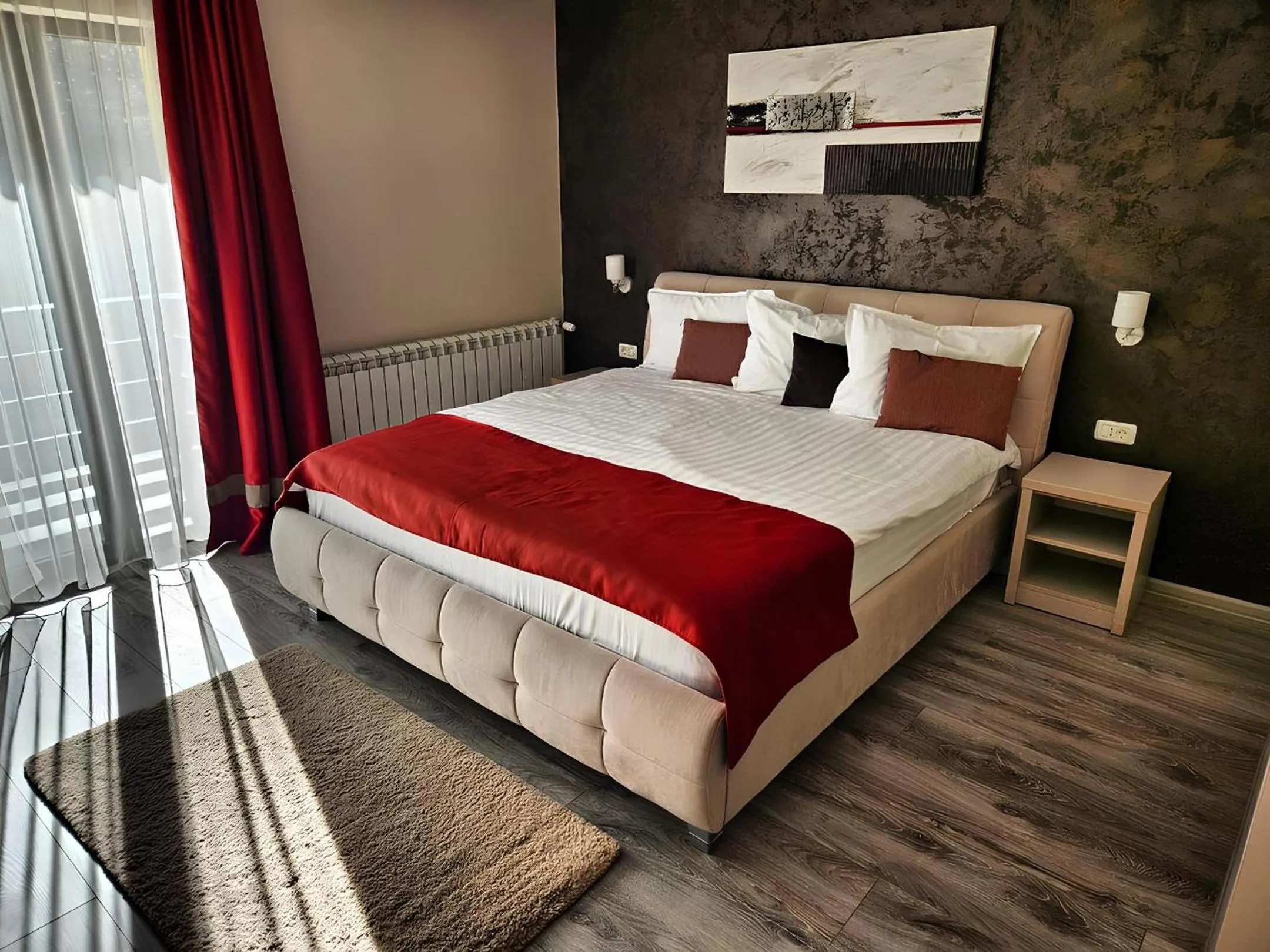 Bed in Pensiunea Andrei Moieciu