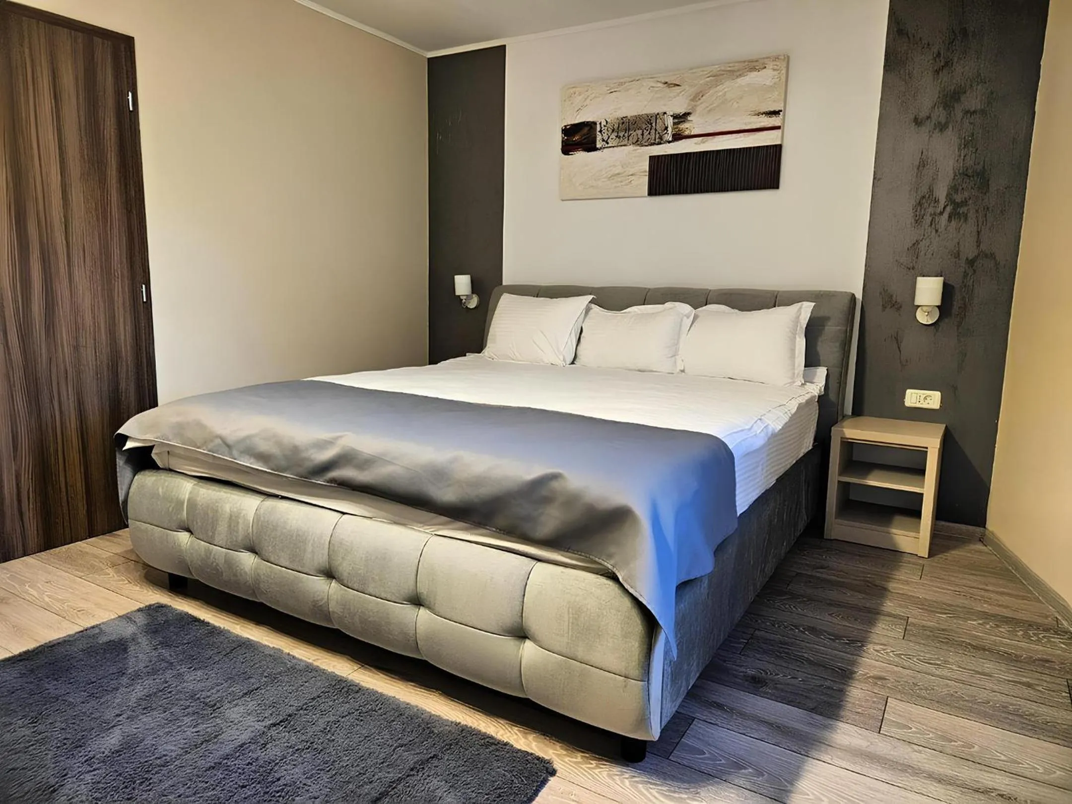 Bed in Pensiunea Andrei Moieciu