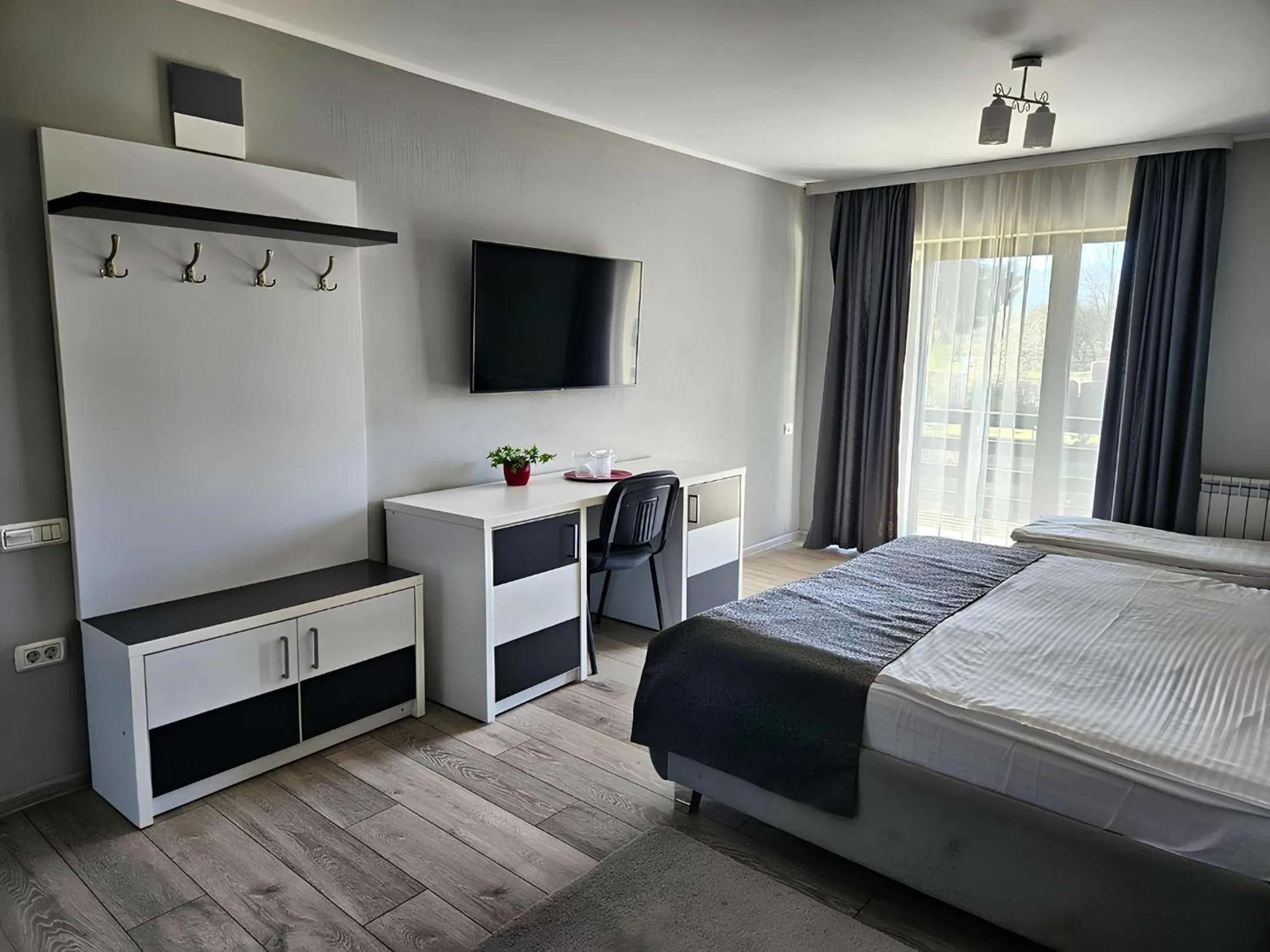 Bed in Pensiunea Andrei Moieciu