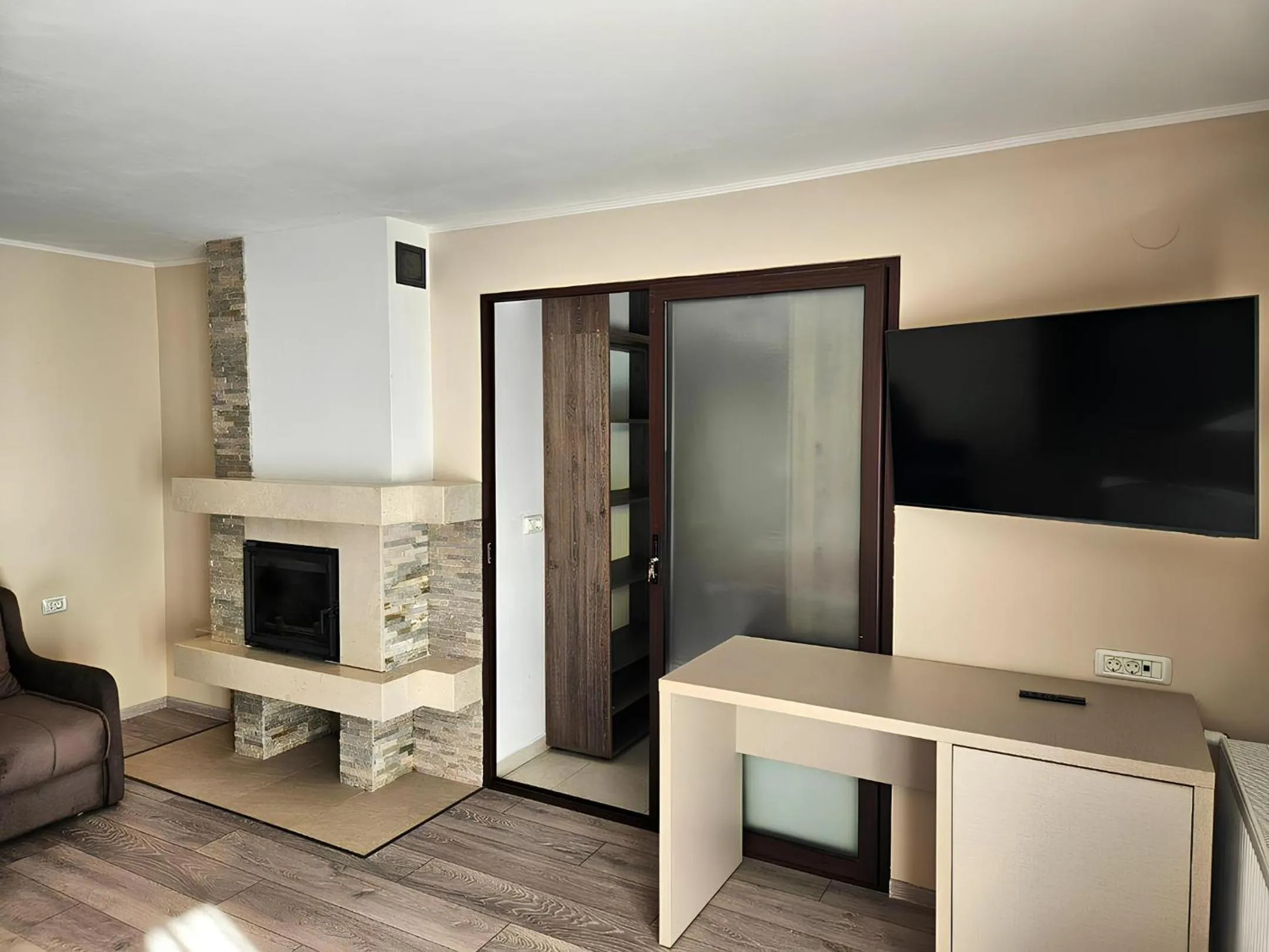 Communal lounge/ TV room in Pensiunea Andrei Moieciu