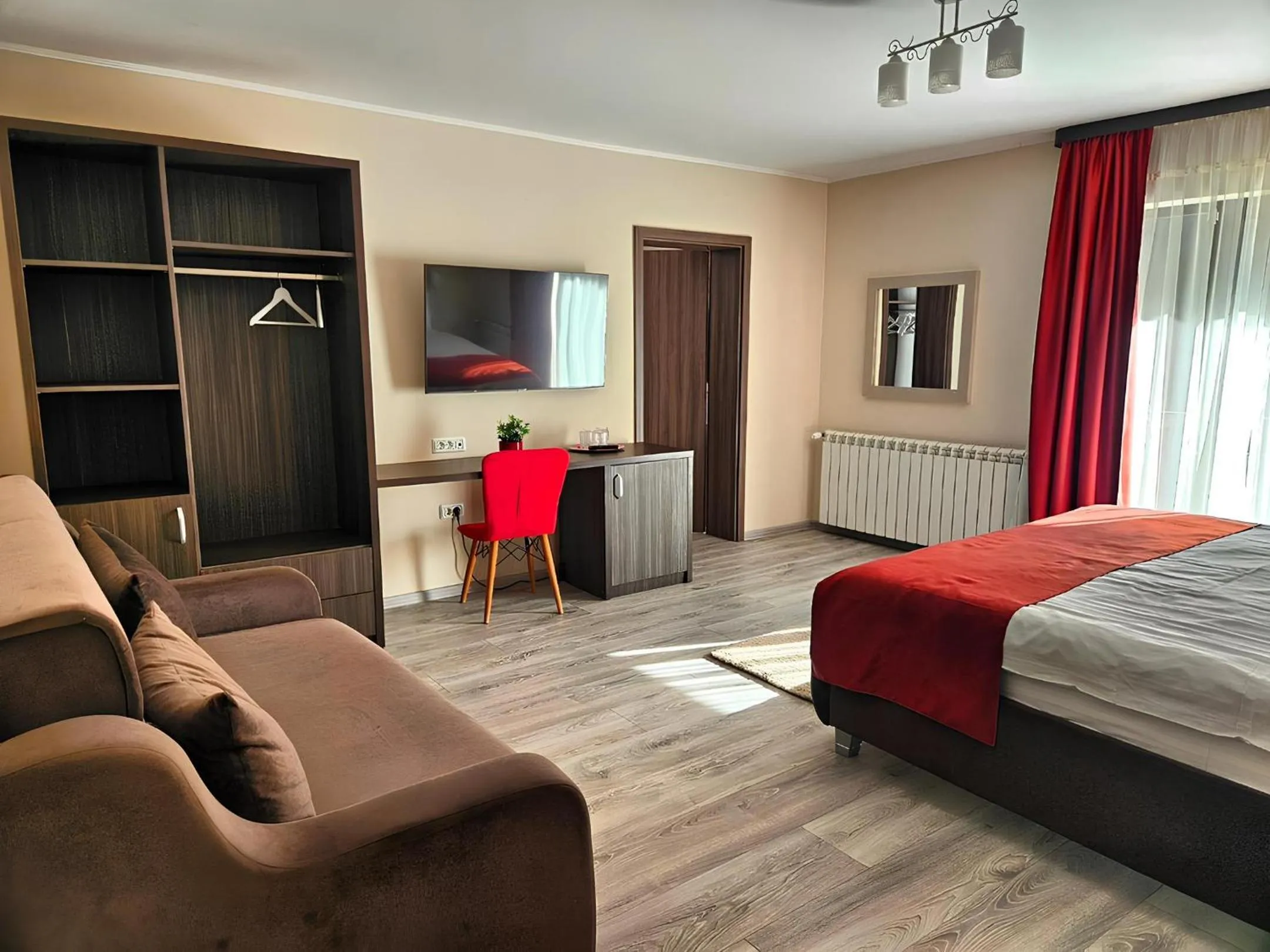 Bed in Pensiunea Andrei Moieciu