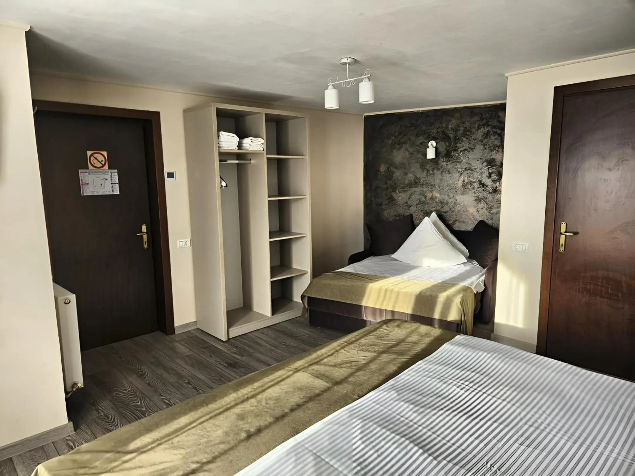 Photo of the whole room, Bed in Pensiunea Andrei Moieciu