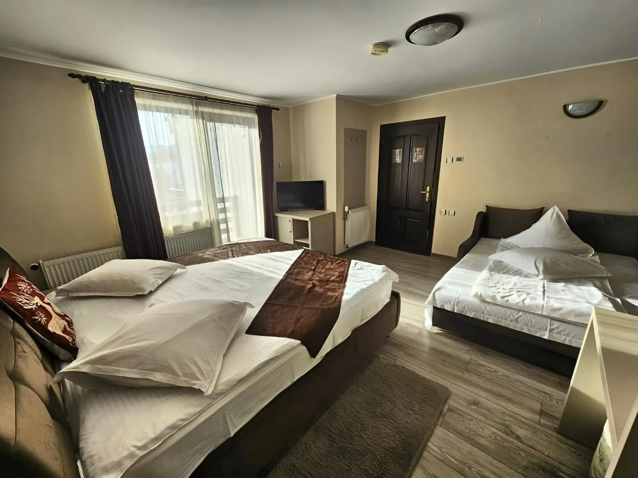 Bedroom, Bed in Pensiunea Andrei Moieciu