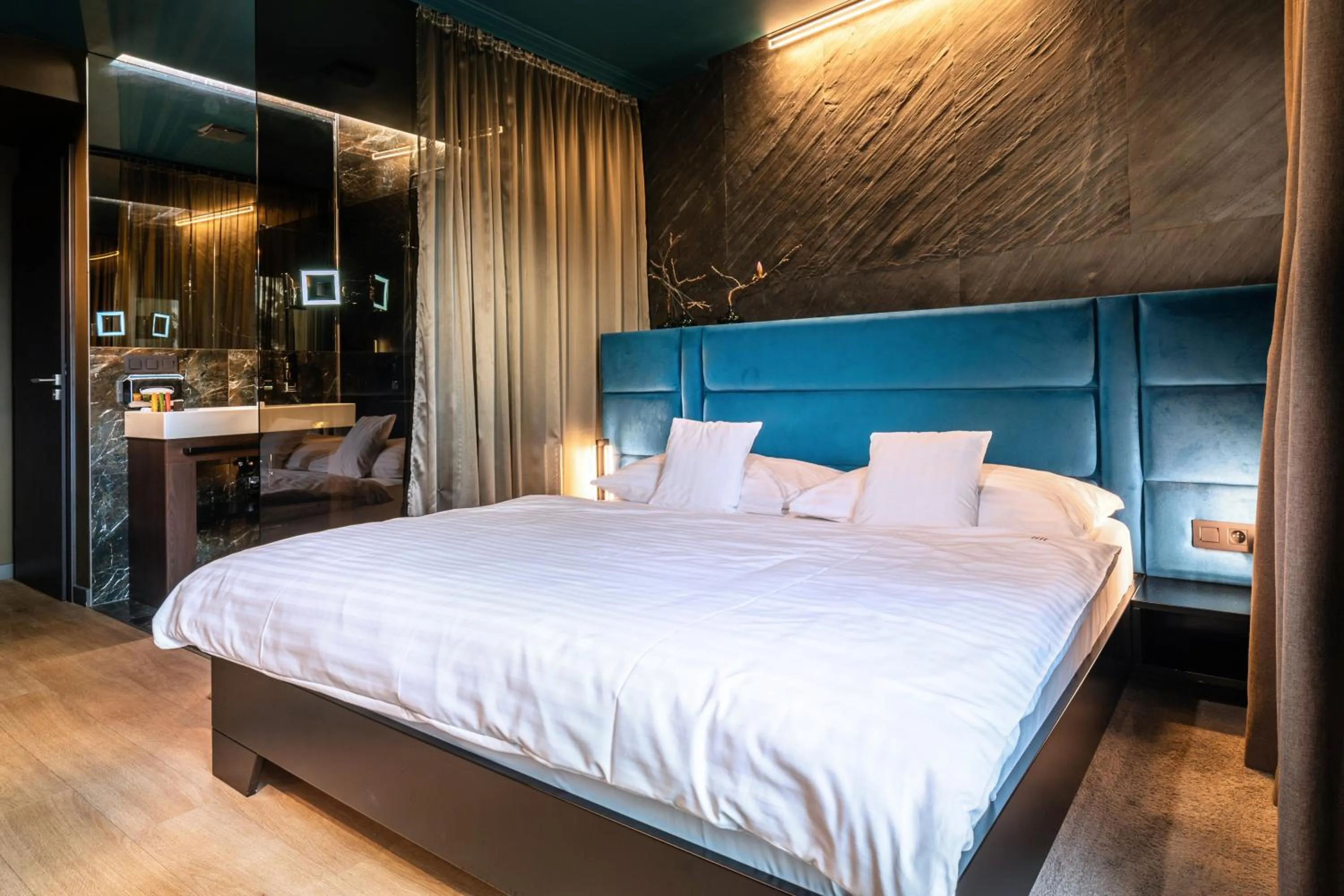 Bed in BOUTIQUE HOTEL11 with rooftop SPA