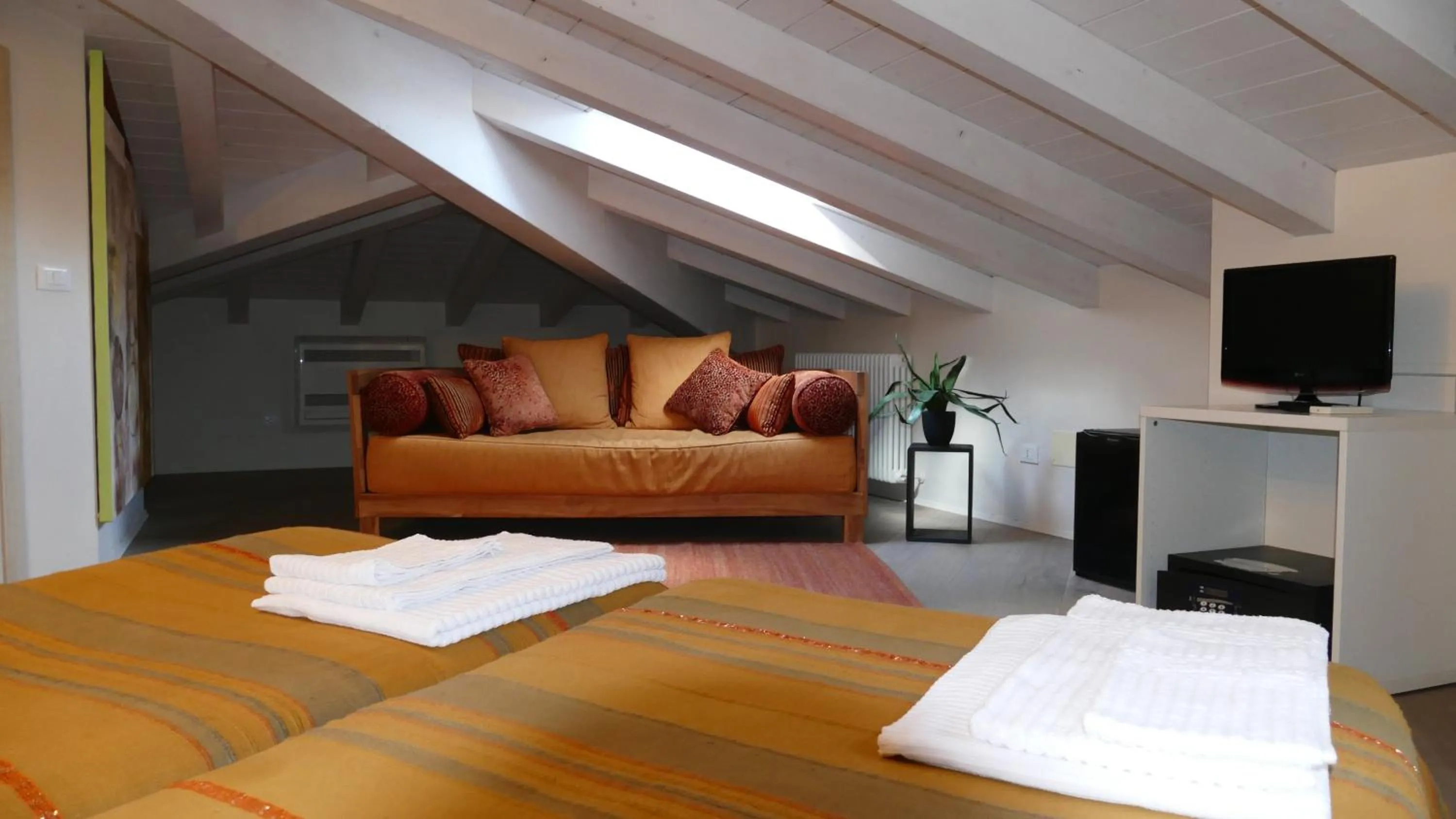 Seating area, Bed in Casa Munay