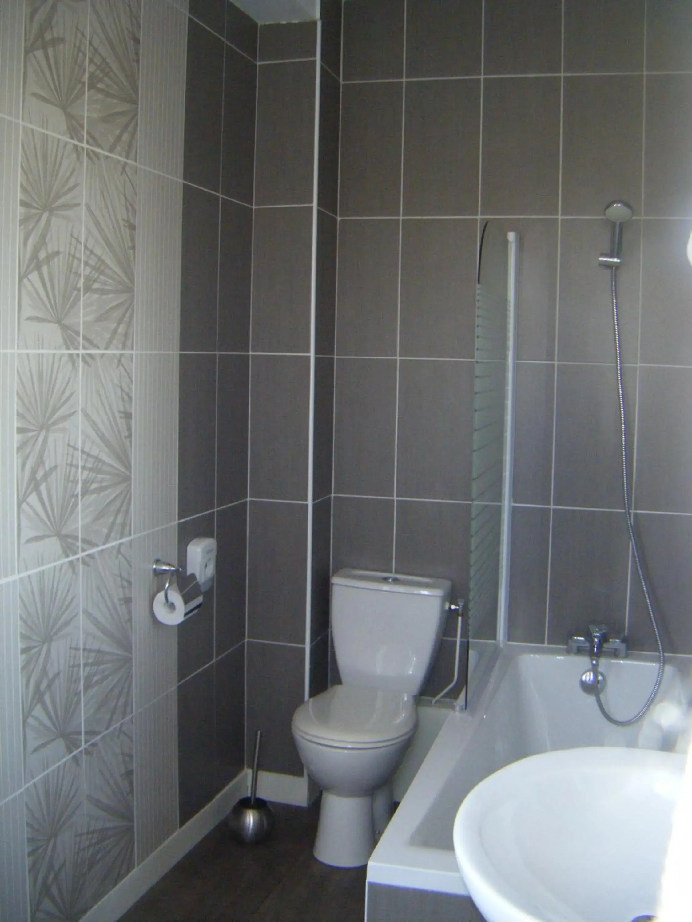 Bathroom in Logis - Hôtel & Restaurant Le Bellevue Bathroom in Logis - Hôtel & Restaurant Le Bellevue