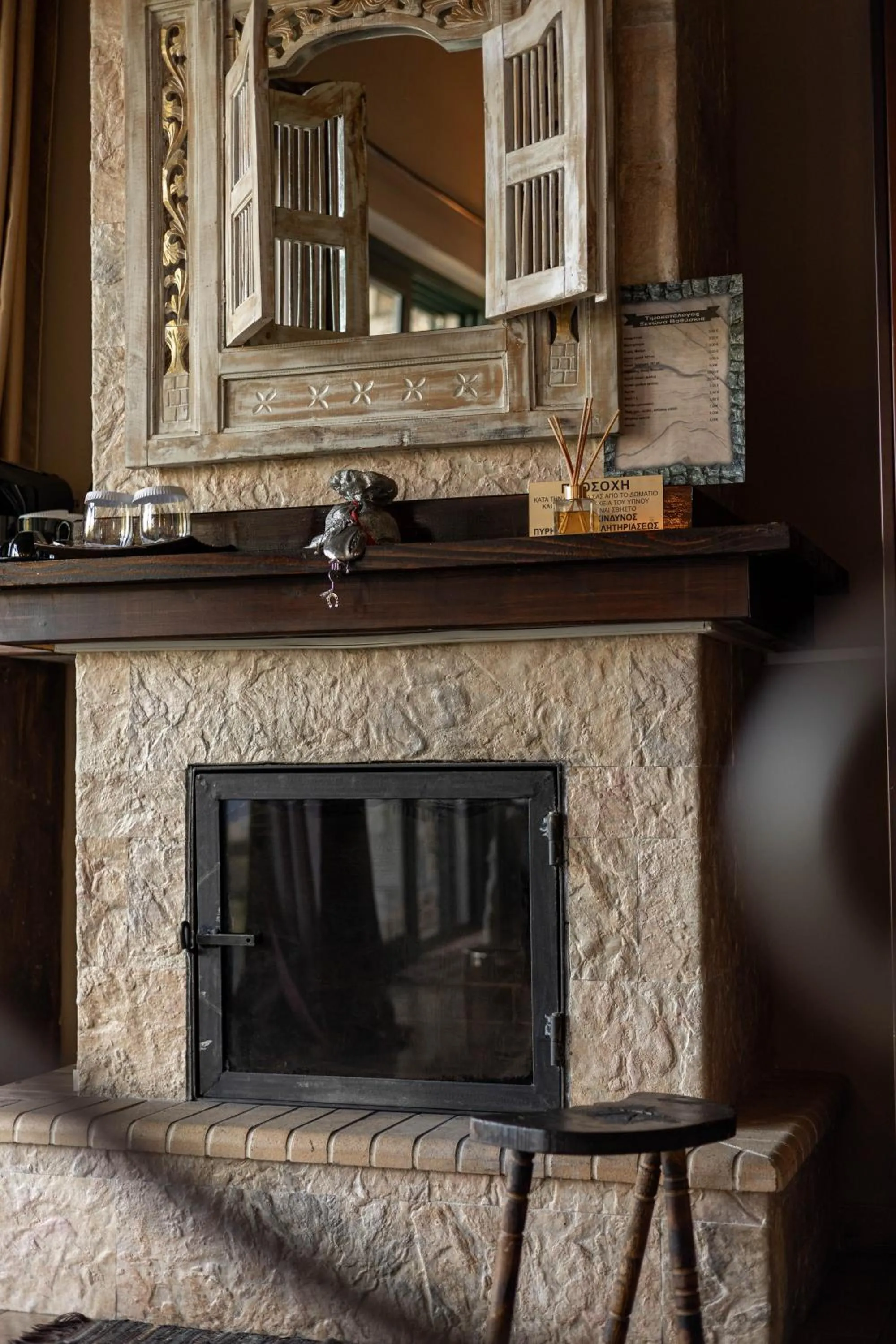 fireplace in Vathyskia Guesthouse