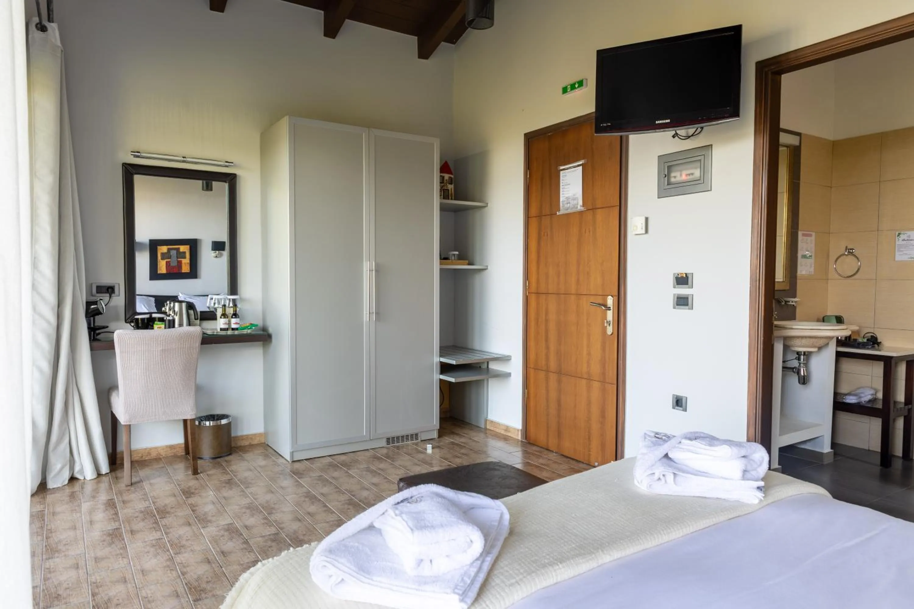 Bed in Vathyskia Guesthouse