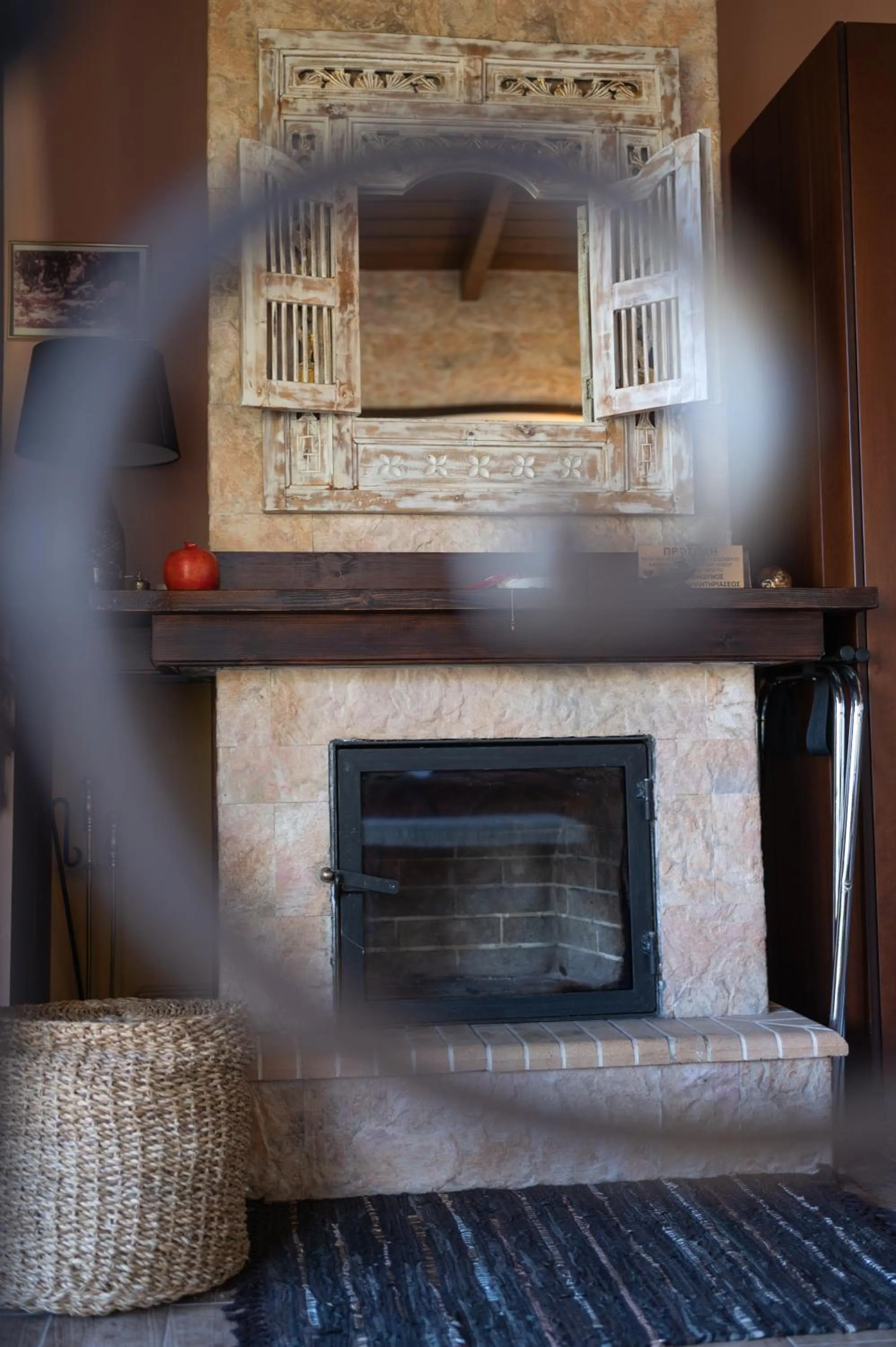 fireplace in Vathyskia Guesthouse