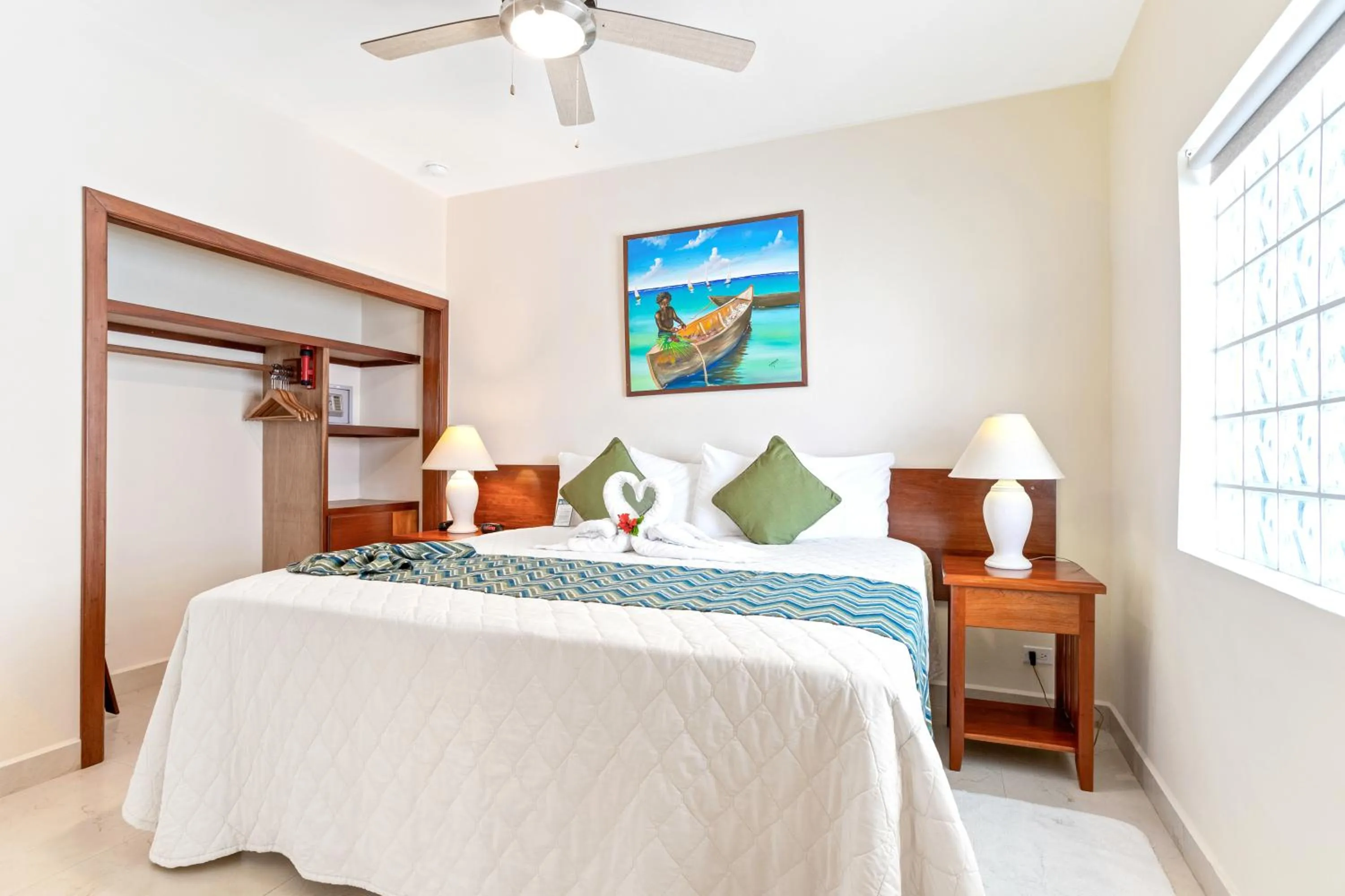 Bed in SunBreeze Suites