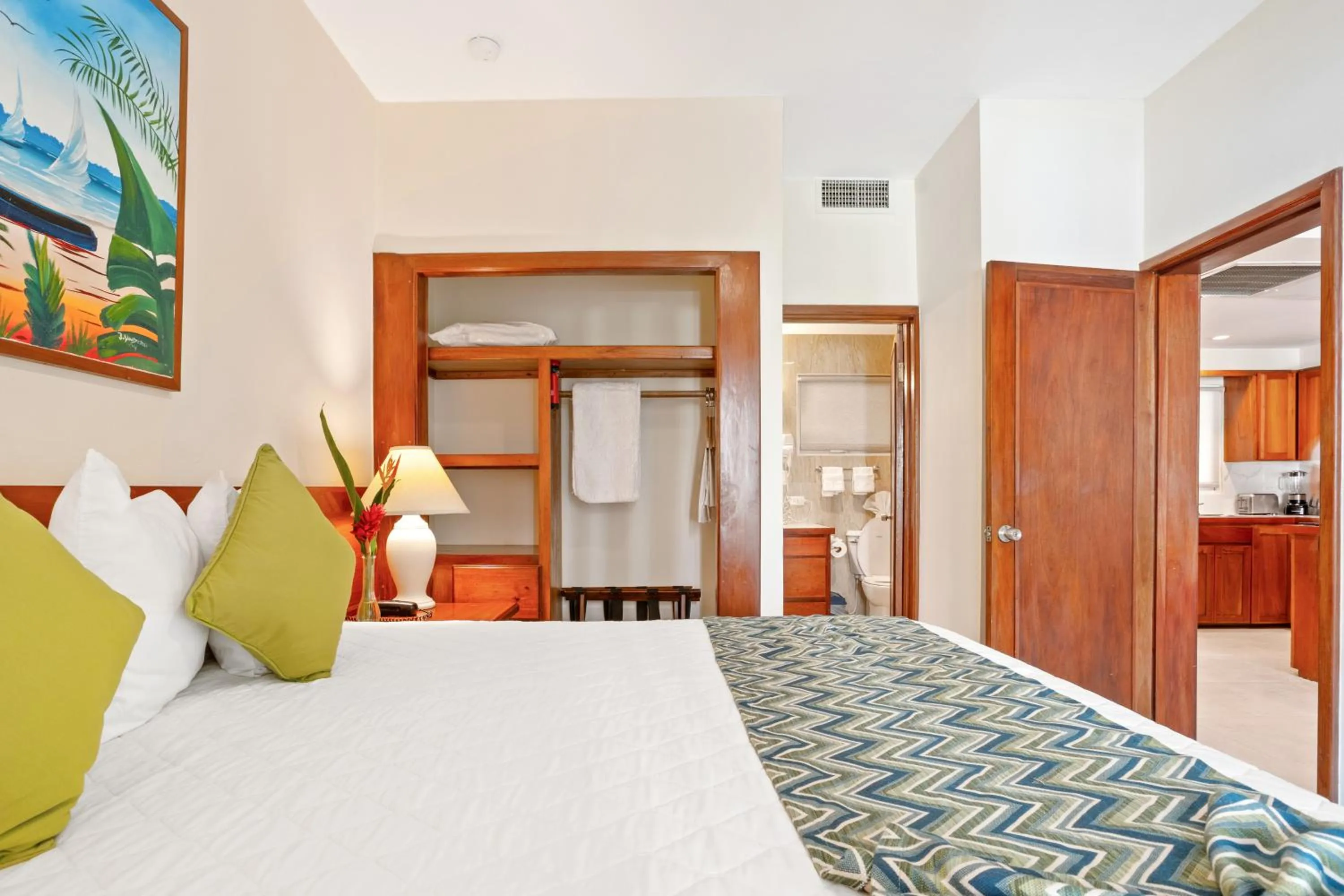 Bed in SunBreeze Suites