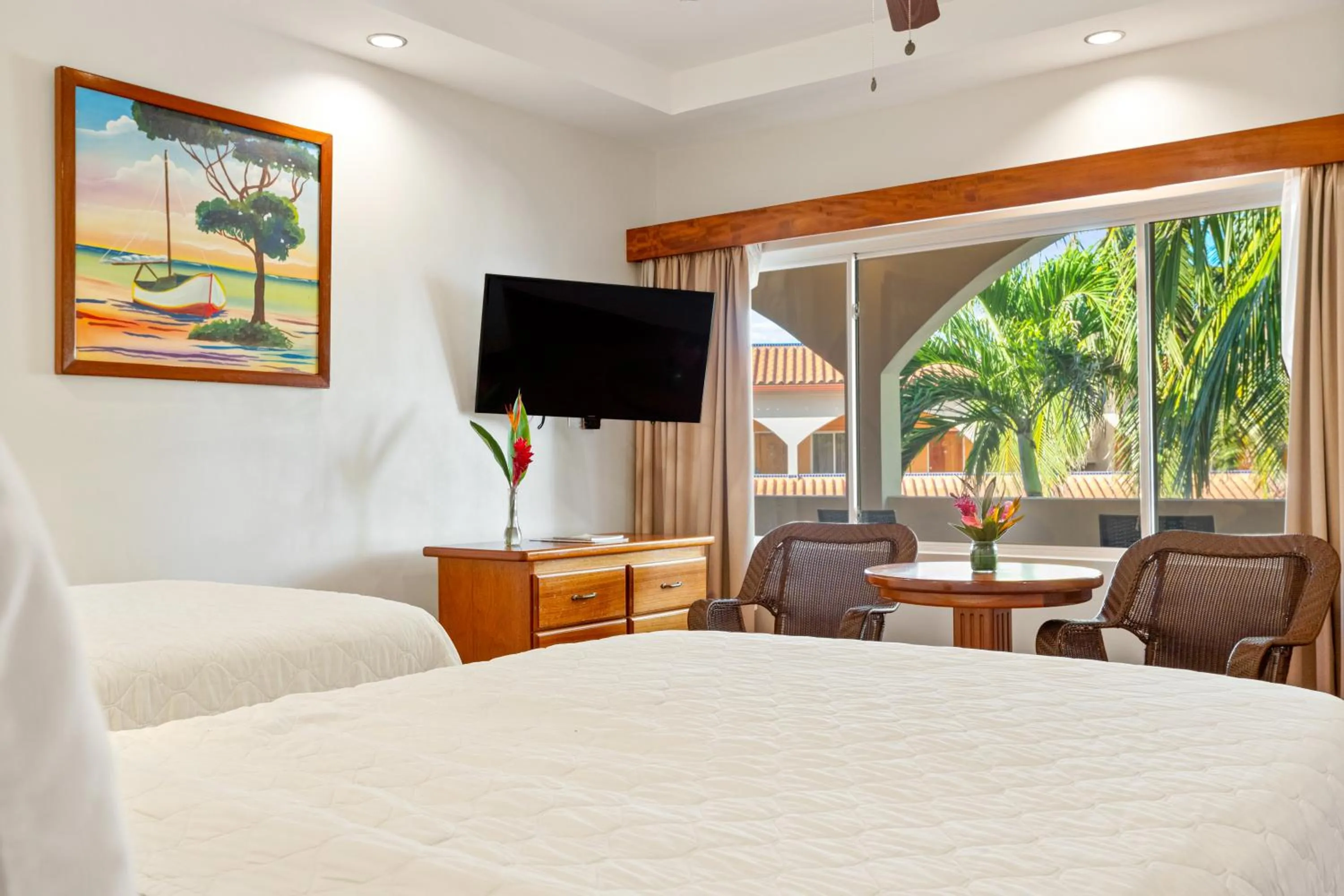 Bed in SunBreeze Hotel