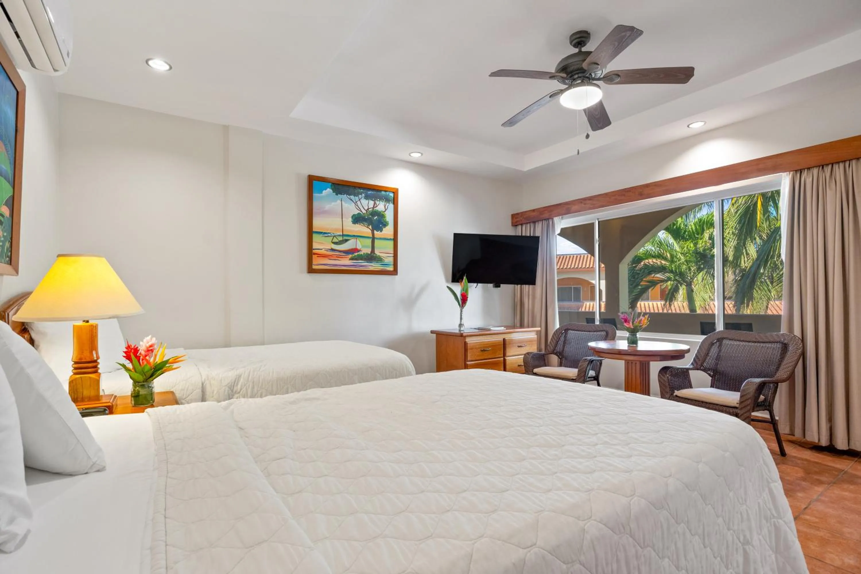 Bed in SunBreeze Hotel