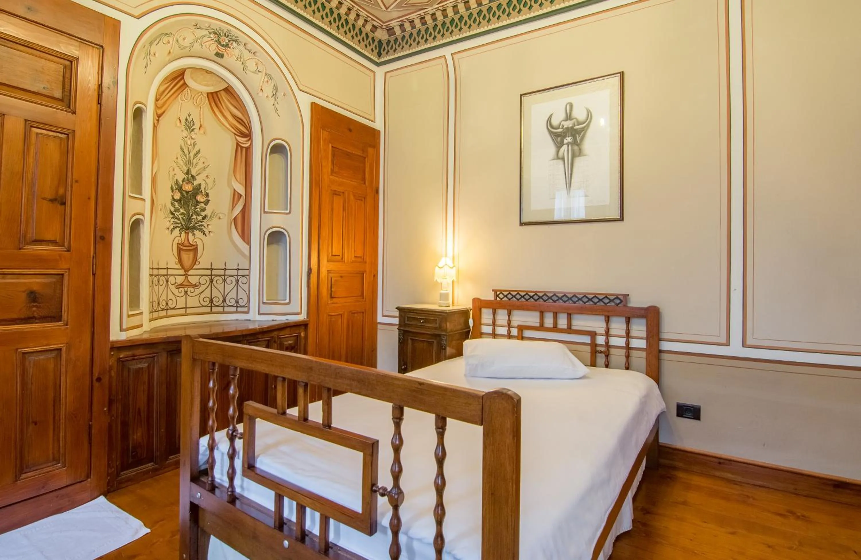 Bed in Old Legends Hotel