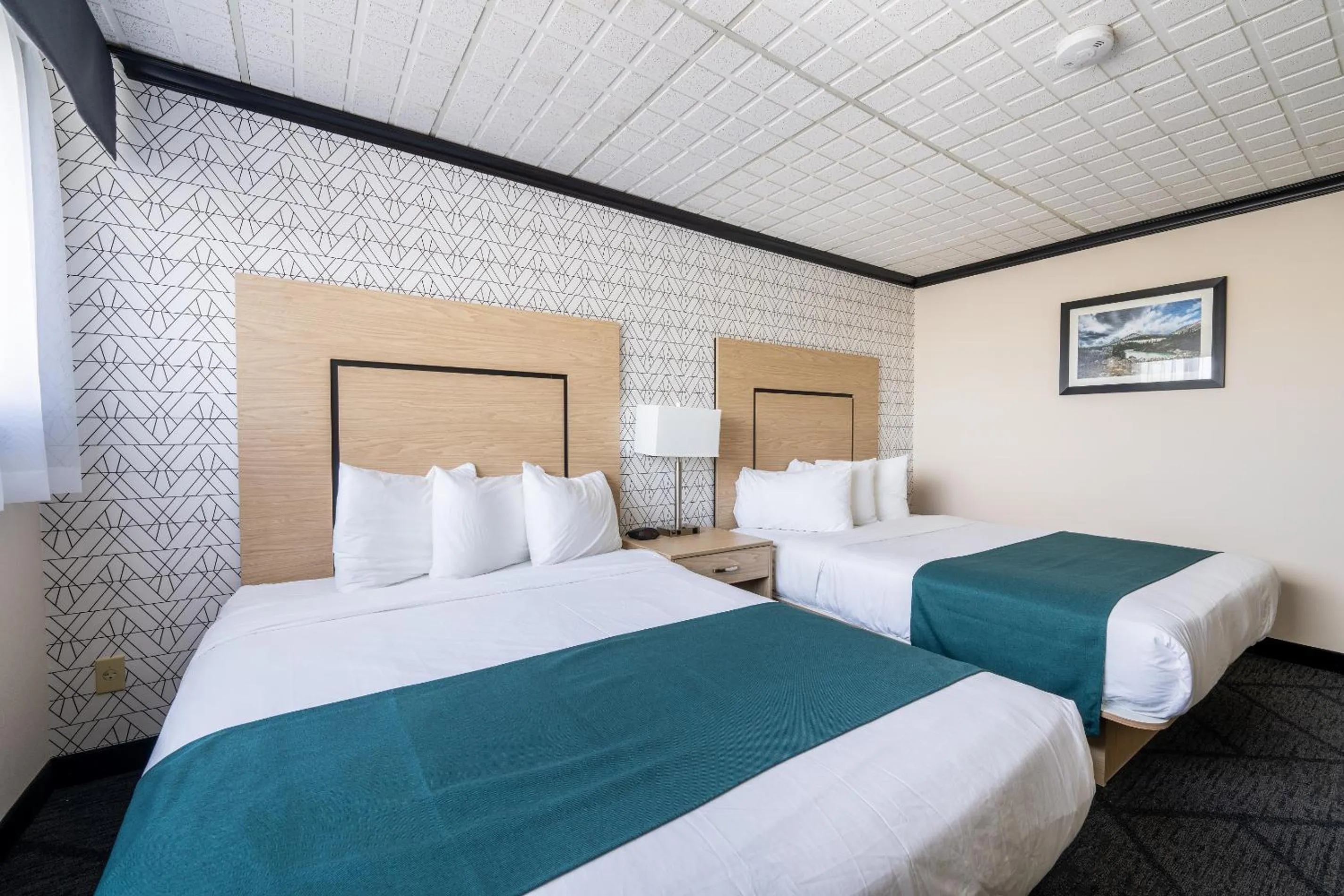 Bed in Sternwheeler Hotel & Conference Centre, Trademark by Wyndham