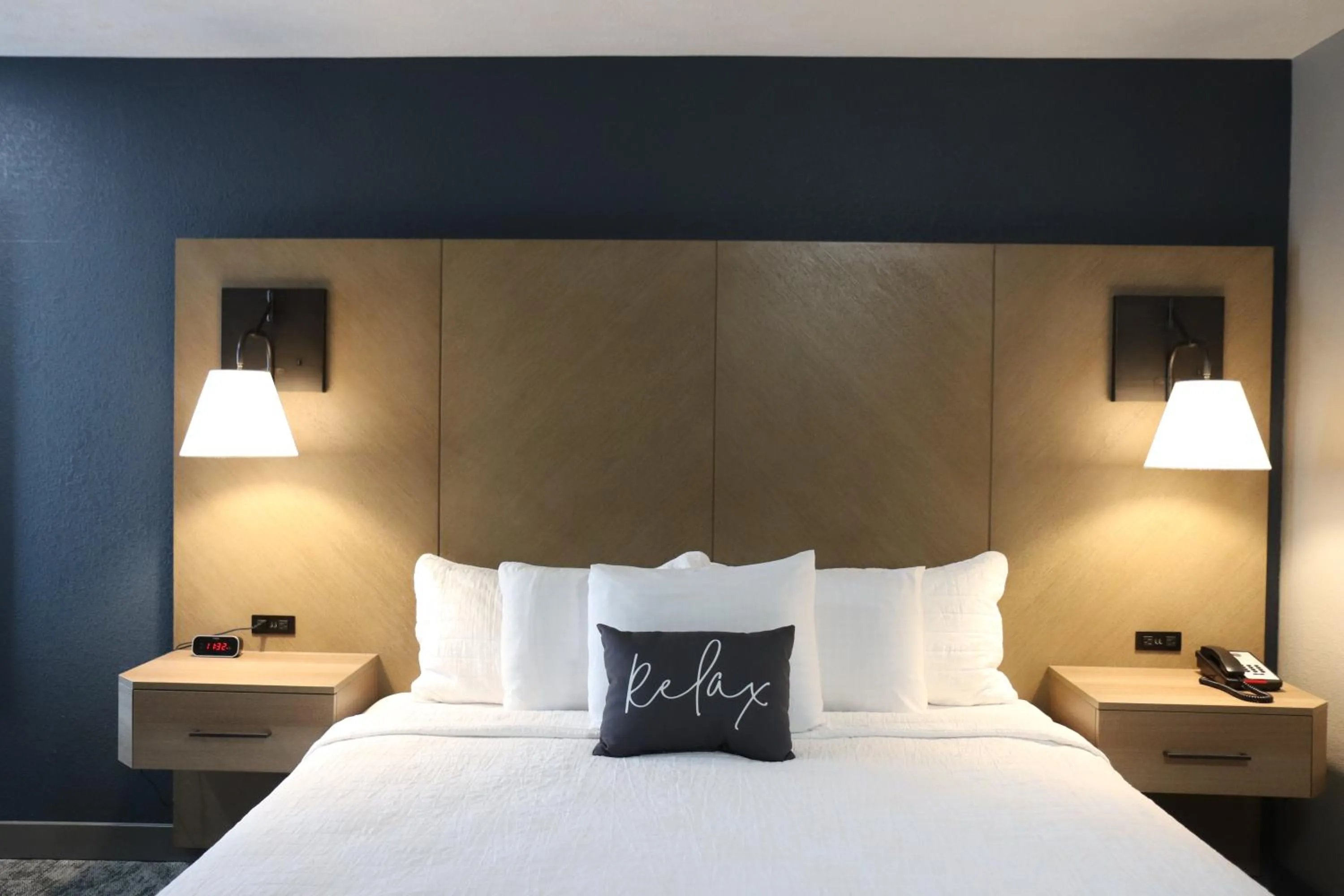 Bed in Eastland Suites Hotel & Conference Ctr, Trademark by Wyndham