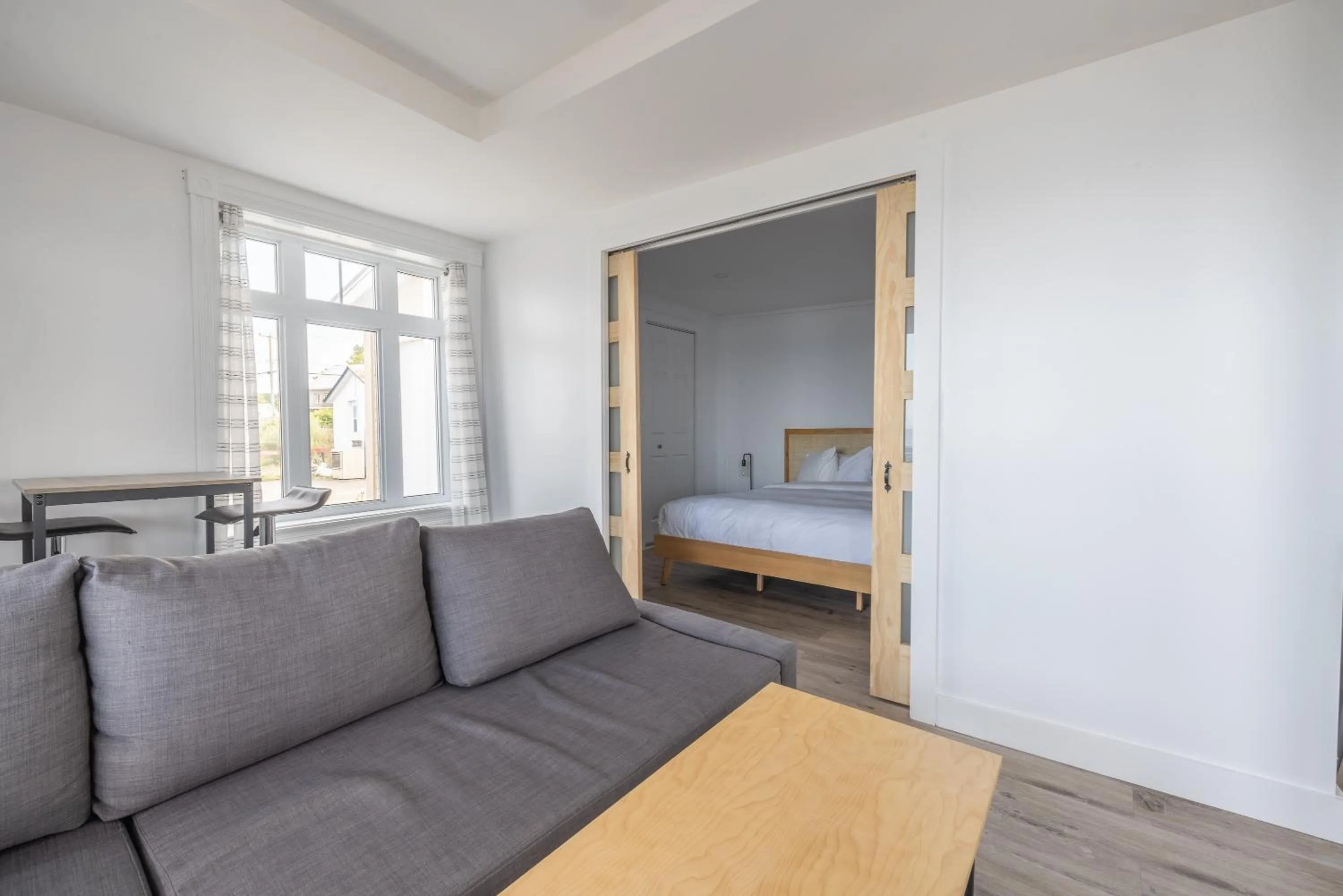 Living room, Bed in Le Gaspesiana