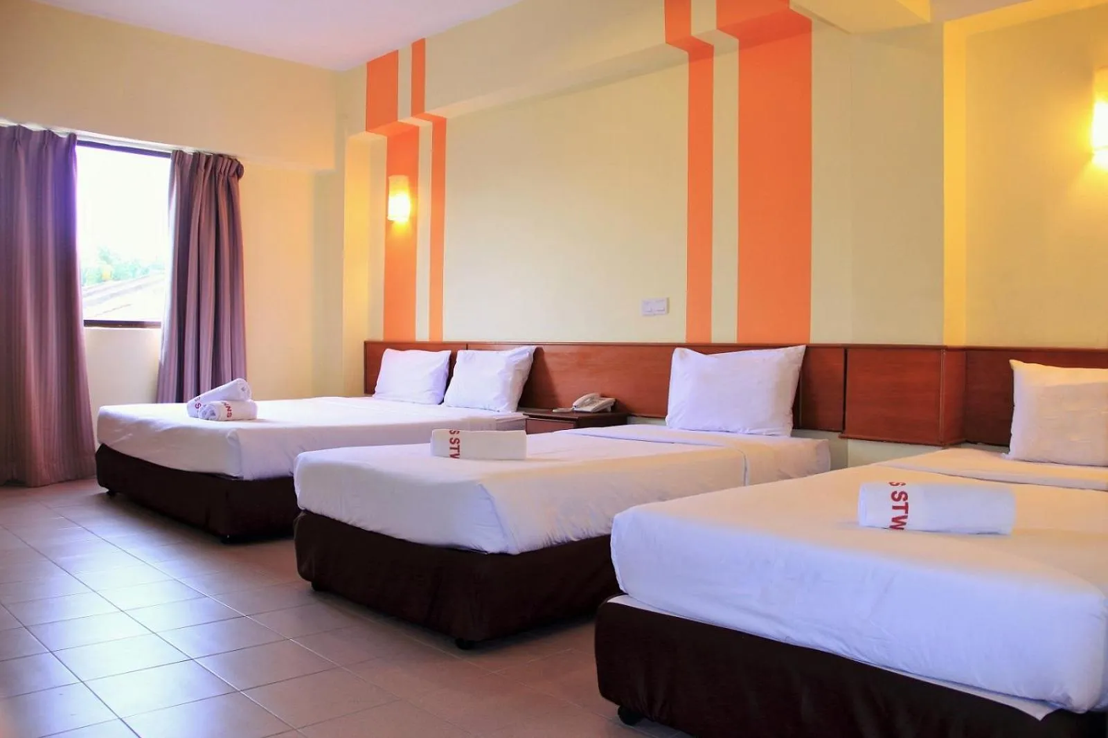 Bedroom, Bed in Sun Inns Hotel Sitiawan