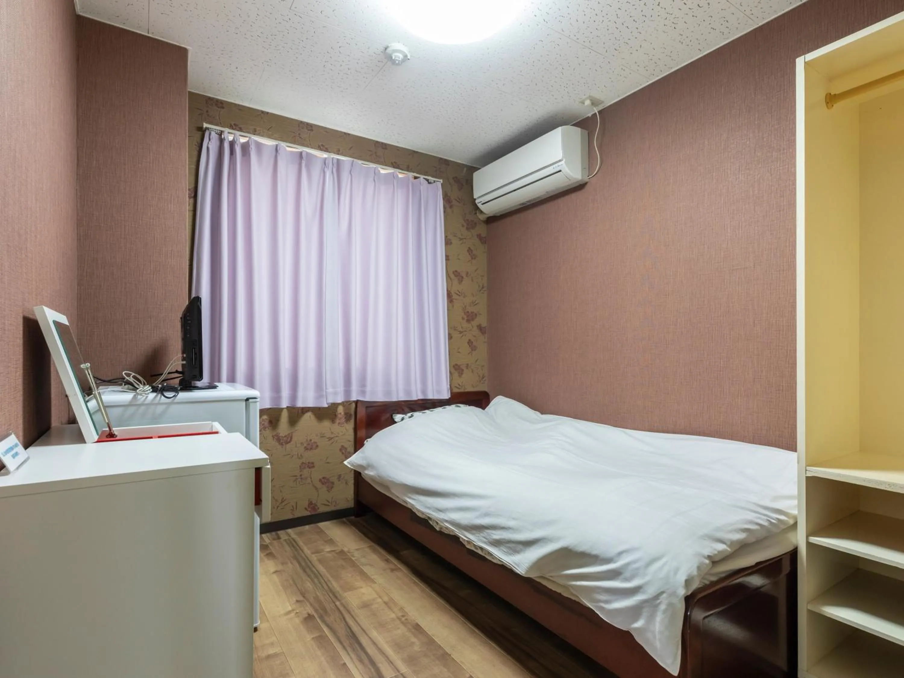 Photo of the whole room, Bed in Business Hotel Kaga