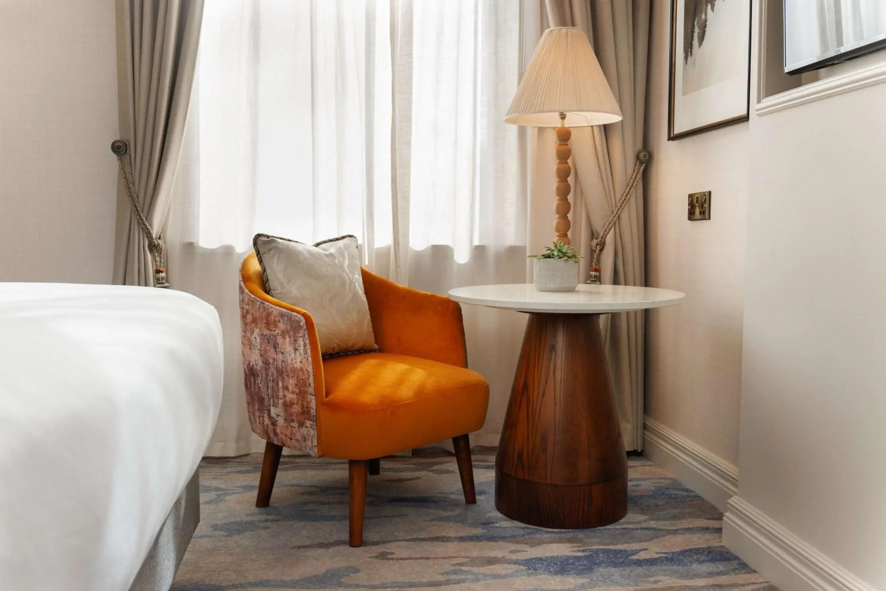 Seating area, Bed in The Caledonian Edinburgh, Curio Collection by Hilton Seating area, Bed in The Caledonian Edinburgh, Curio Collection by Hilton