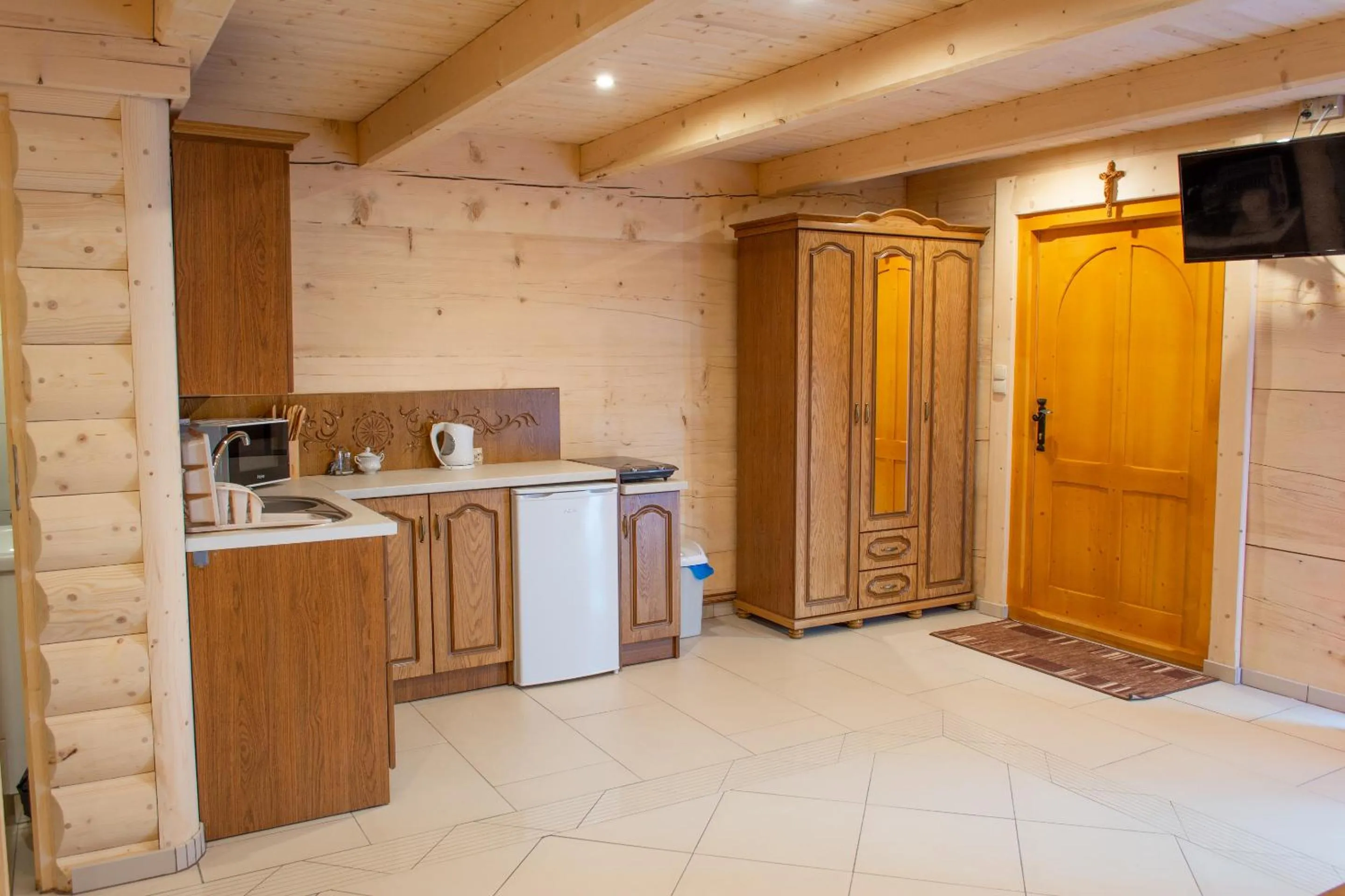 Kitchen or kitchenette in Leśny Dwór