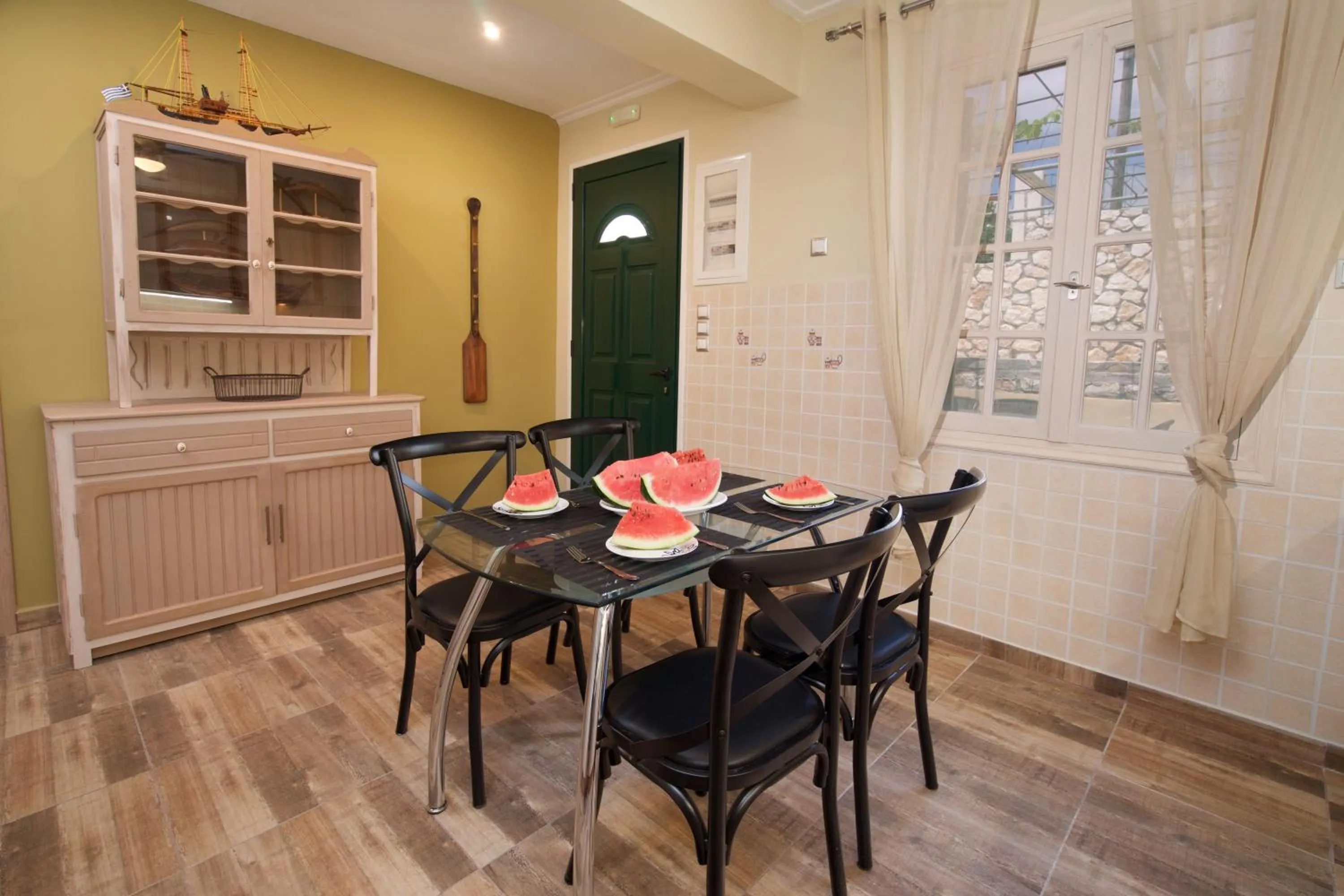 Dining area in Villa Apoplous with pool