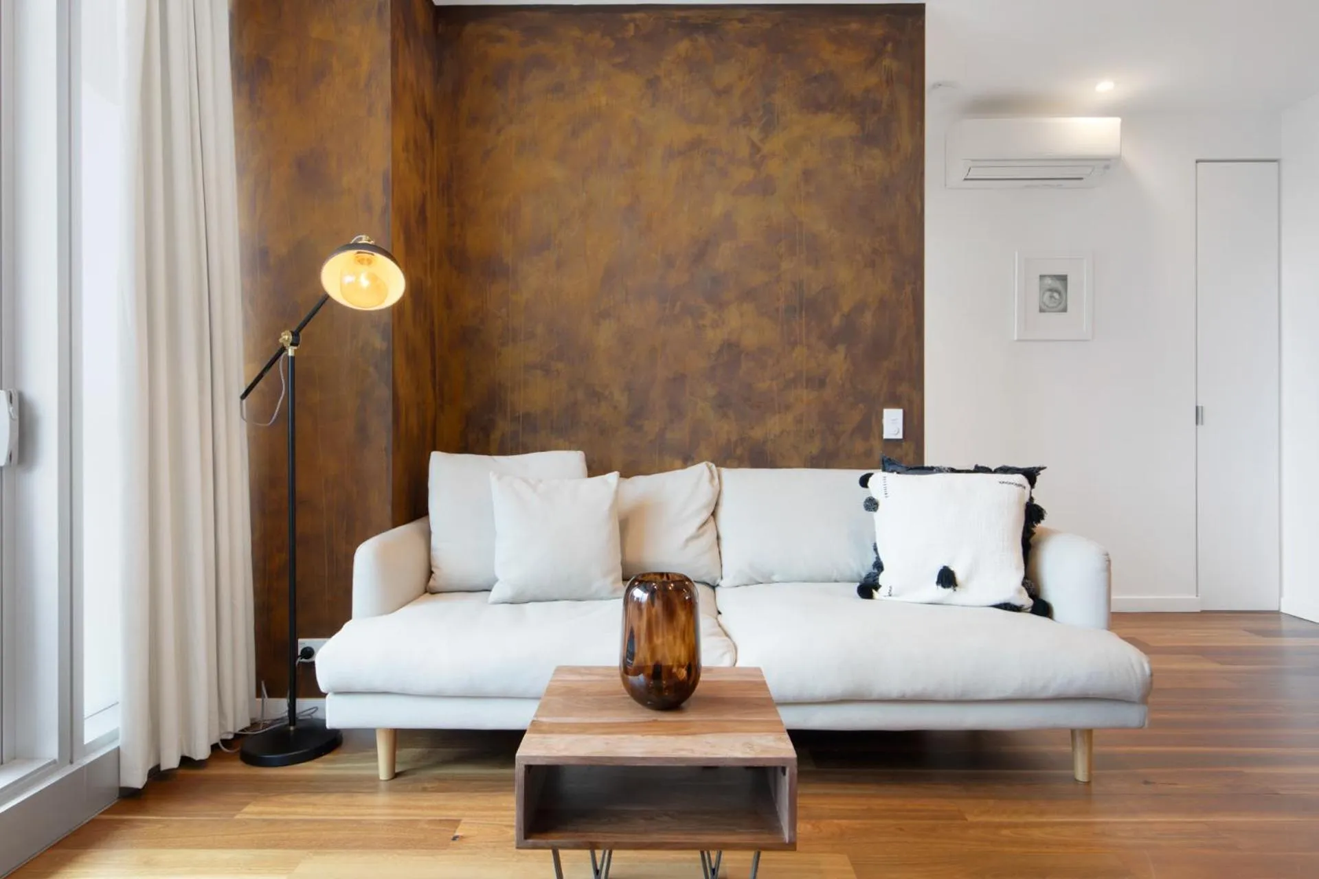 Living room in The Sebel Residences Melbourne Docklands Serviced Apartments