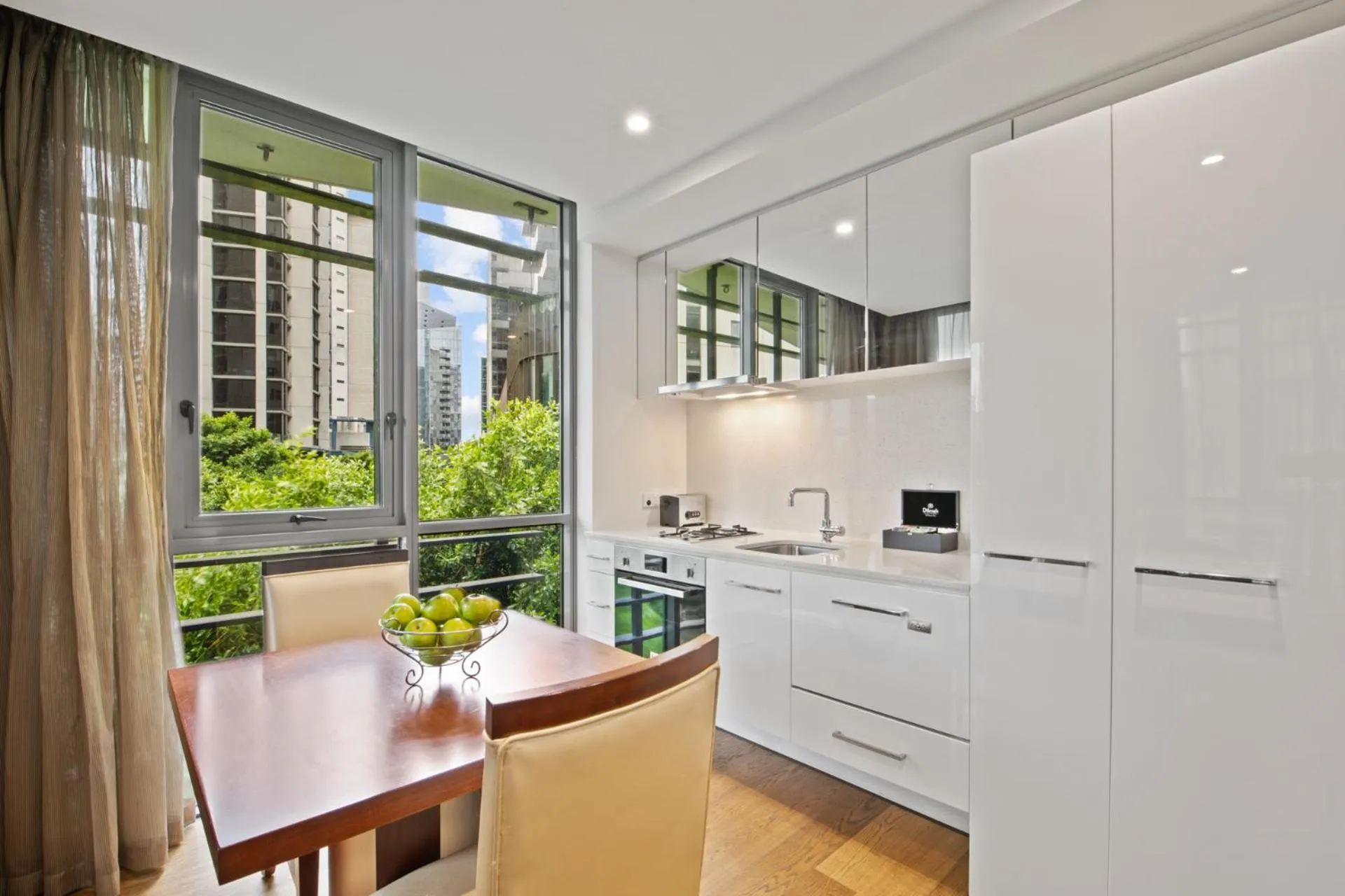 Dining area in The Sebel Residences Melbourne Docklands Serviced Apartments