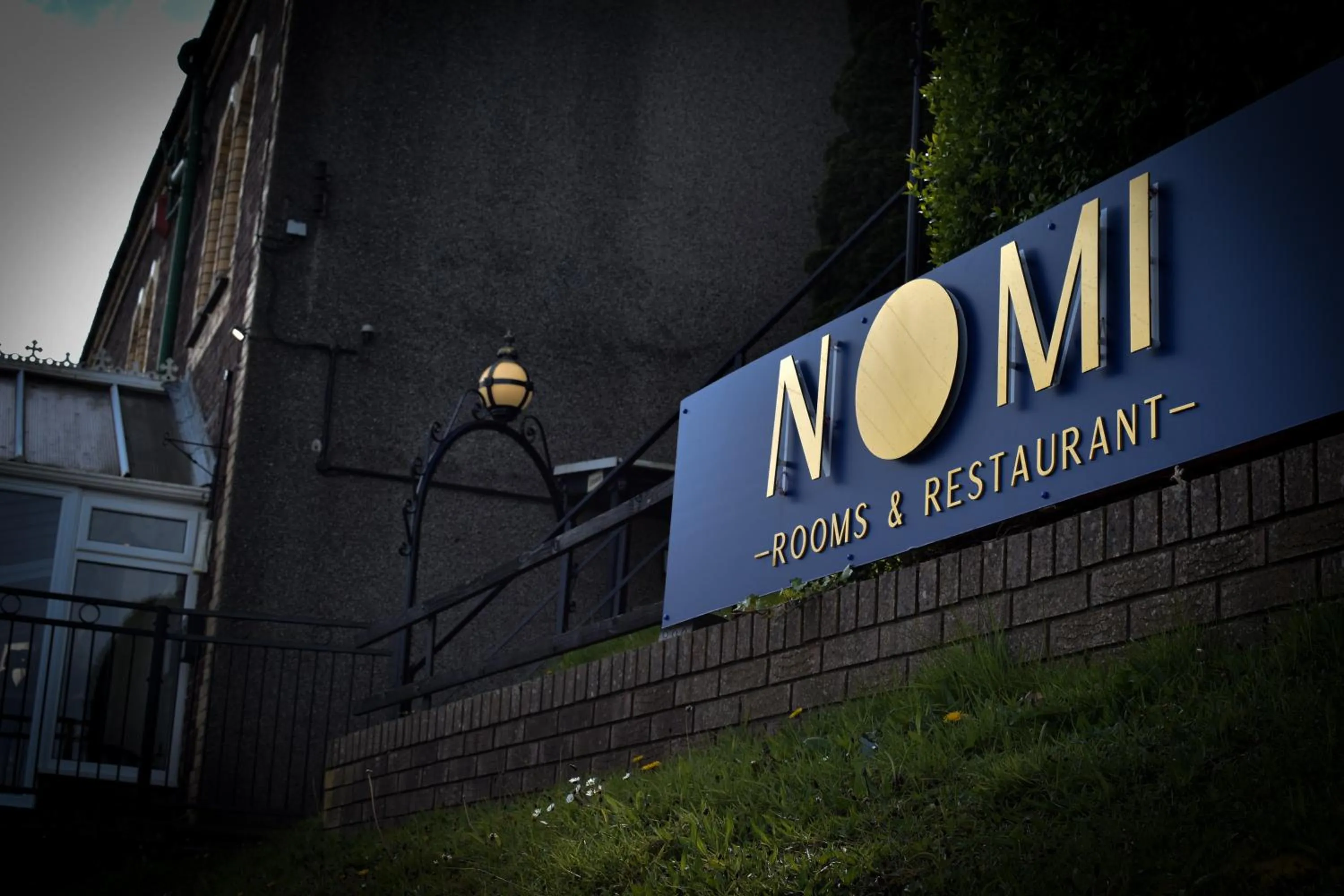 Property building in Nomi Rooms & Restaurant