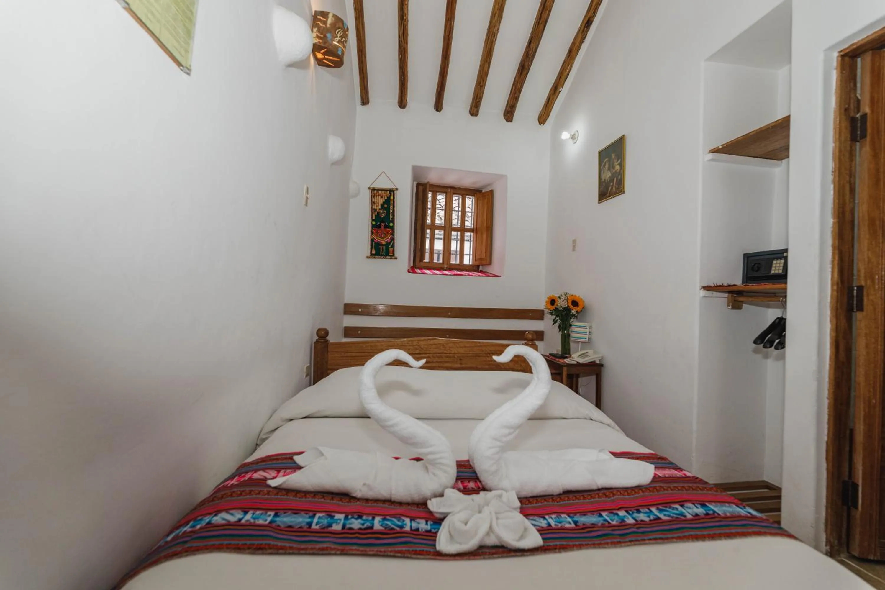 Bed in Hostal El Grial