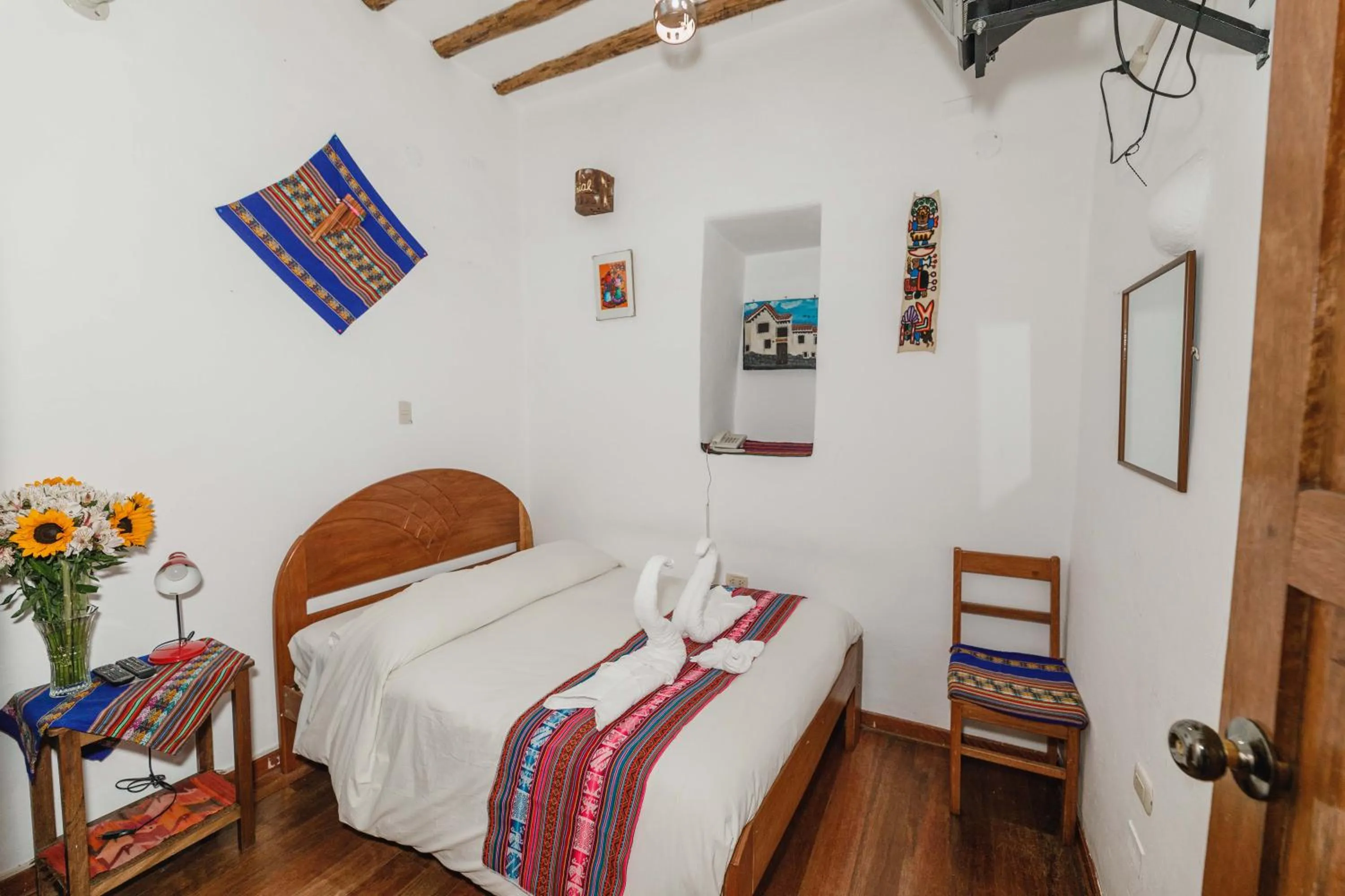 Bed in Hostal El Grial