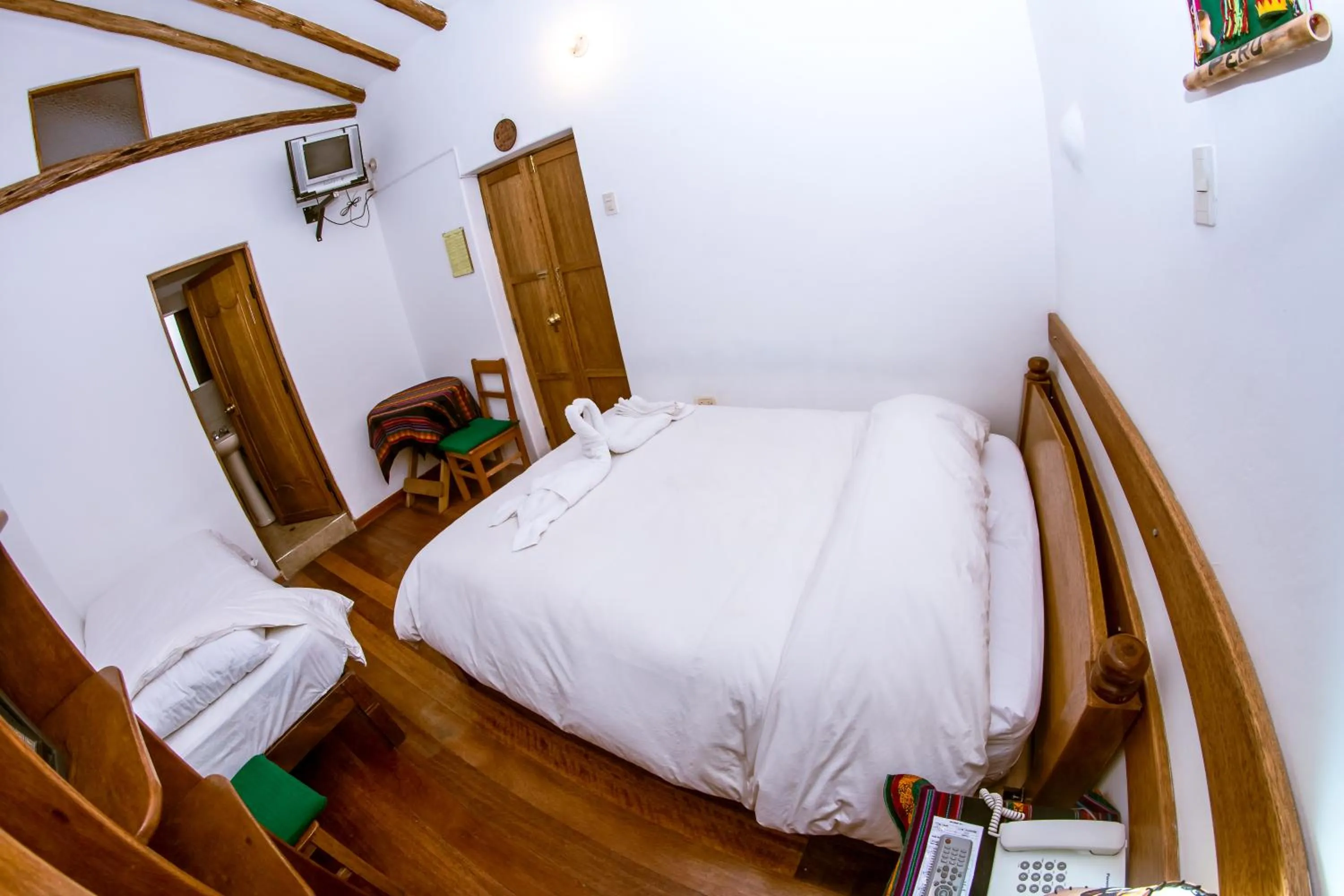 Photo of the whole room, Bed in Hostal El Grial