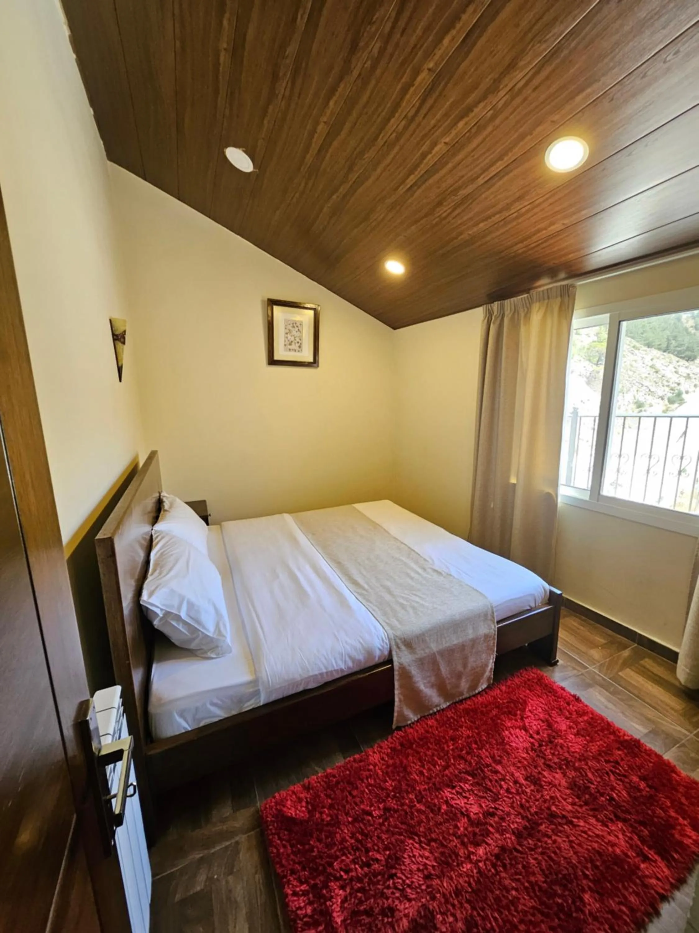 Bed in Hotel L'Aiglon