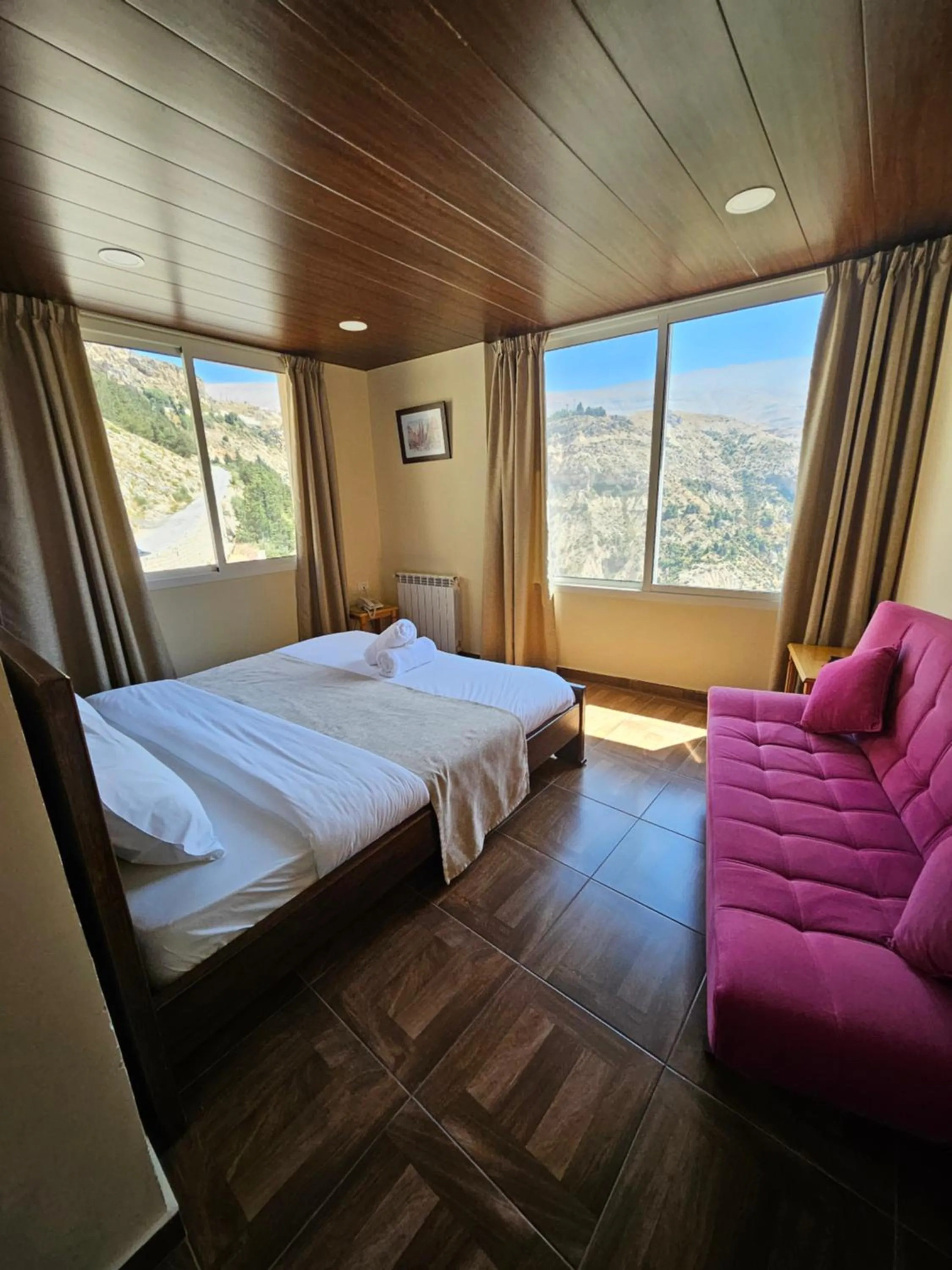 Bed in Hotel L'Aiglon