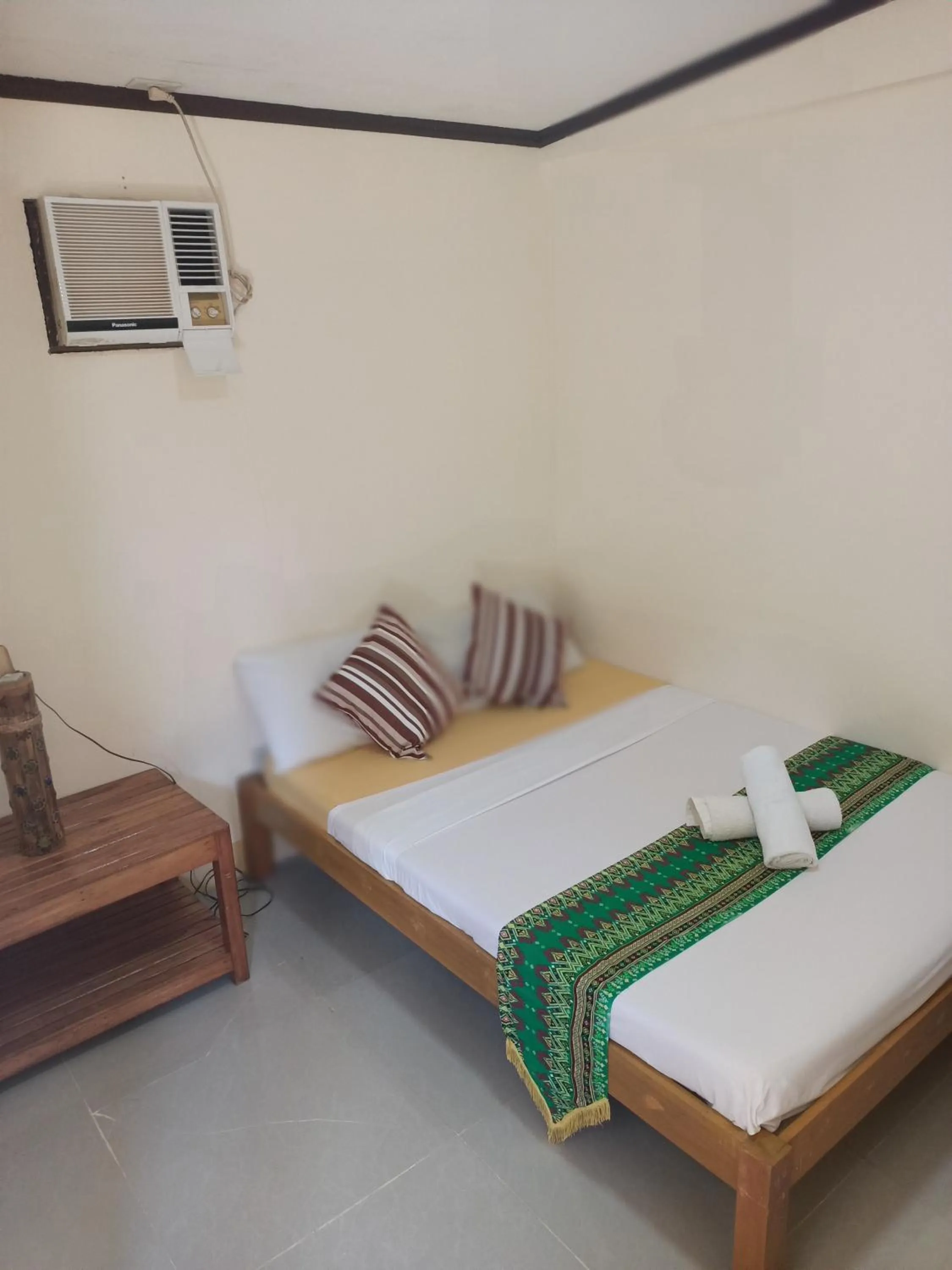 Bed in Telesfora Beach Cottage