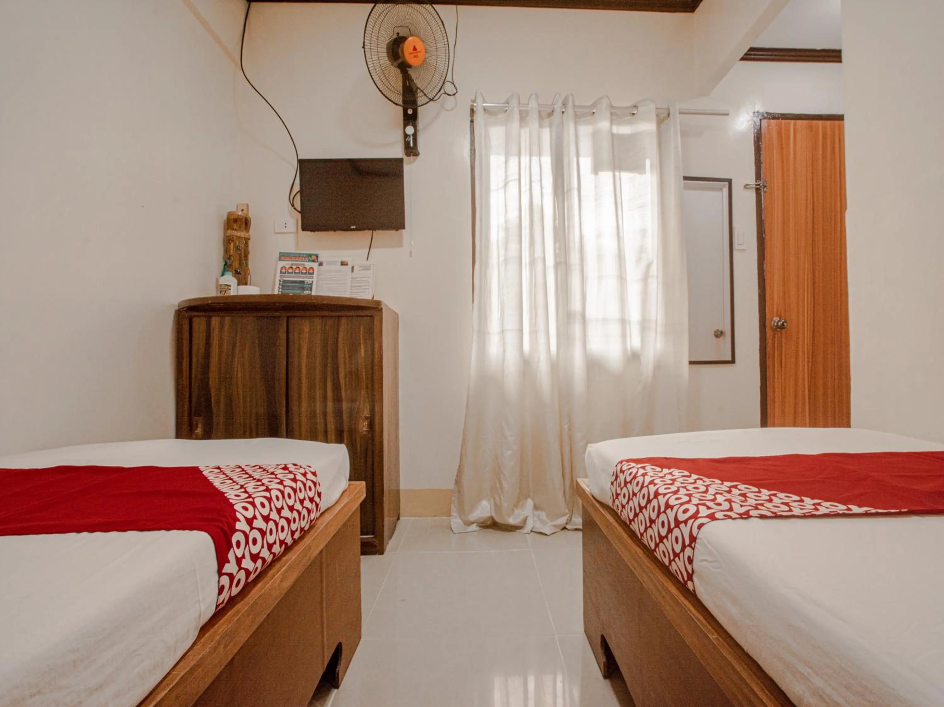 Bed in Telesfora Beach Cottage