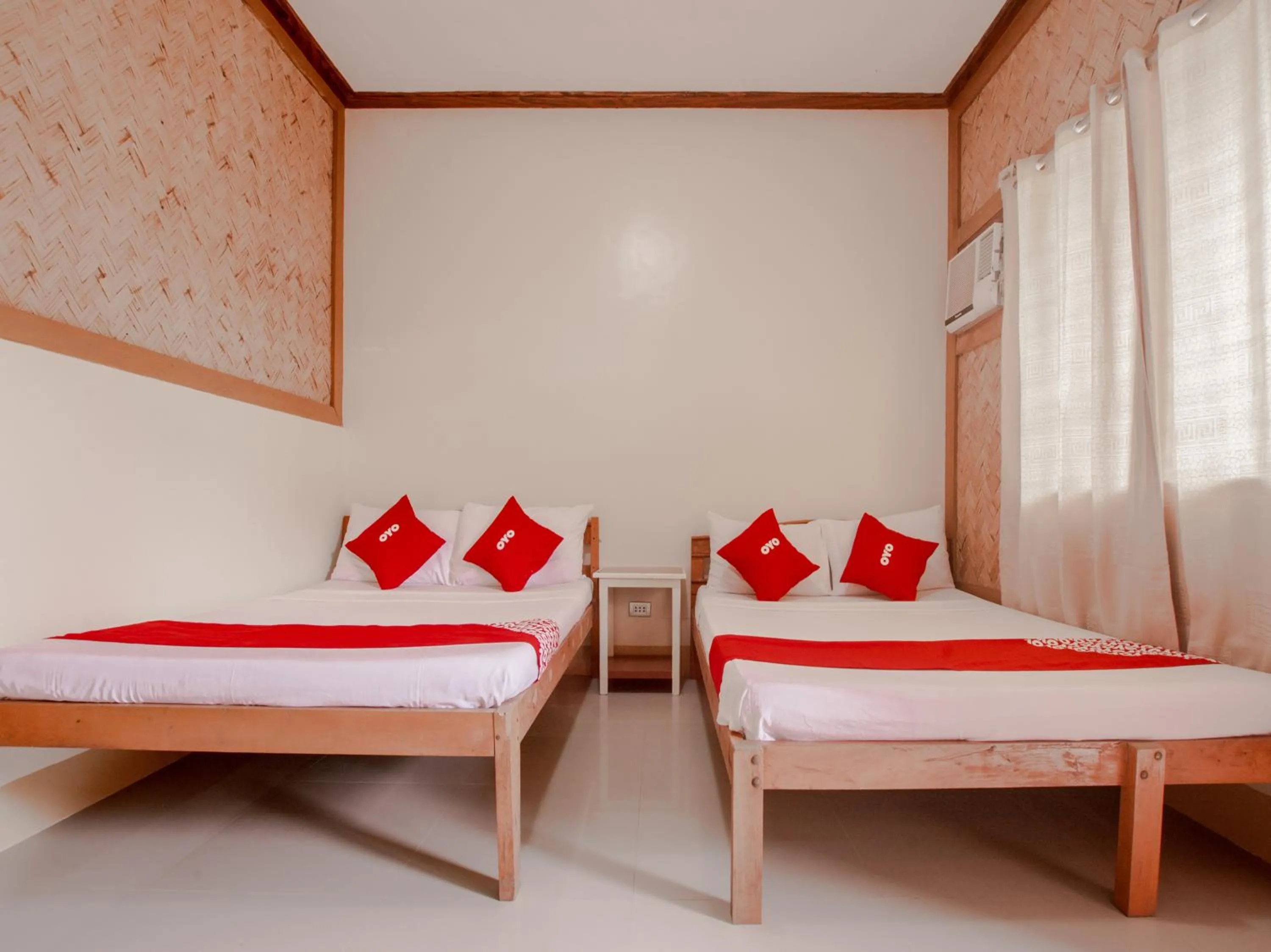 Bed in Telesfora Beach Cottage