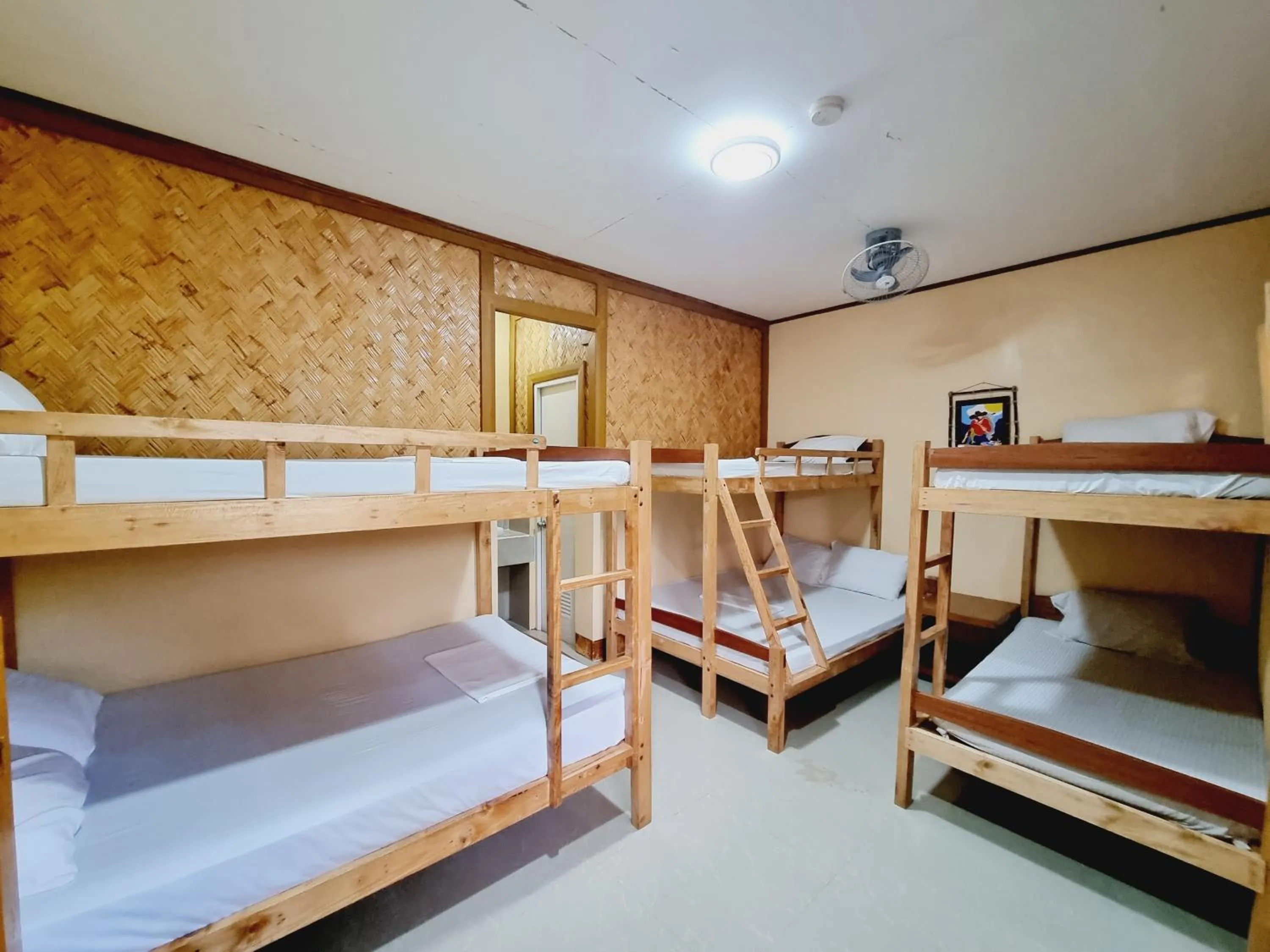 Bed in Telesfora Beach Cottage