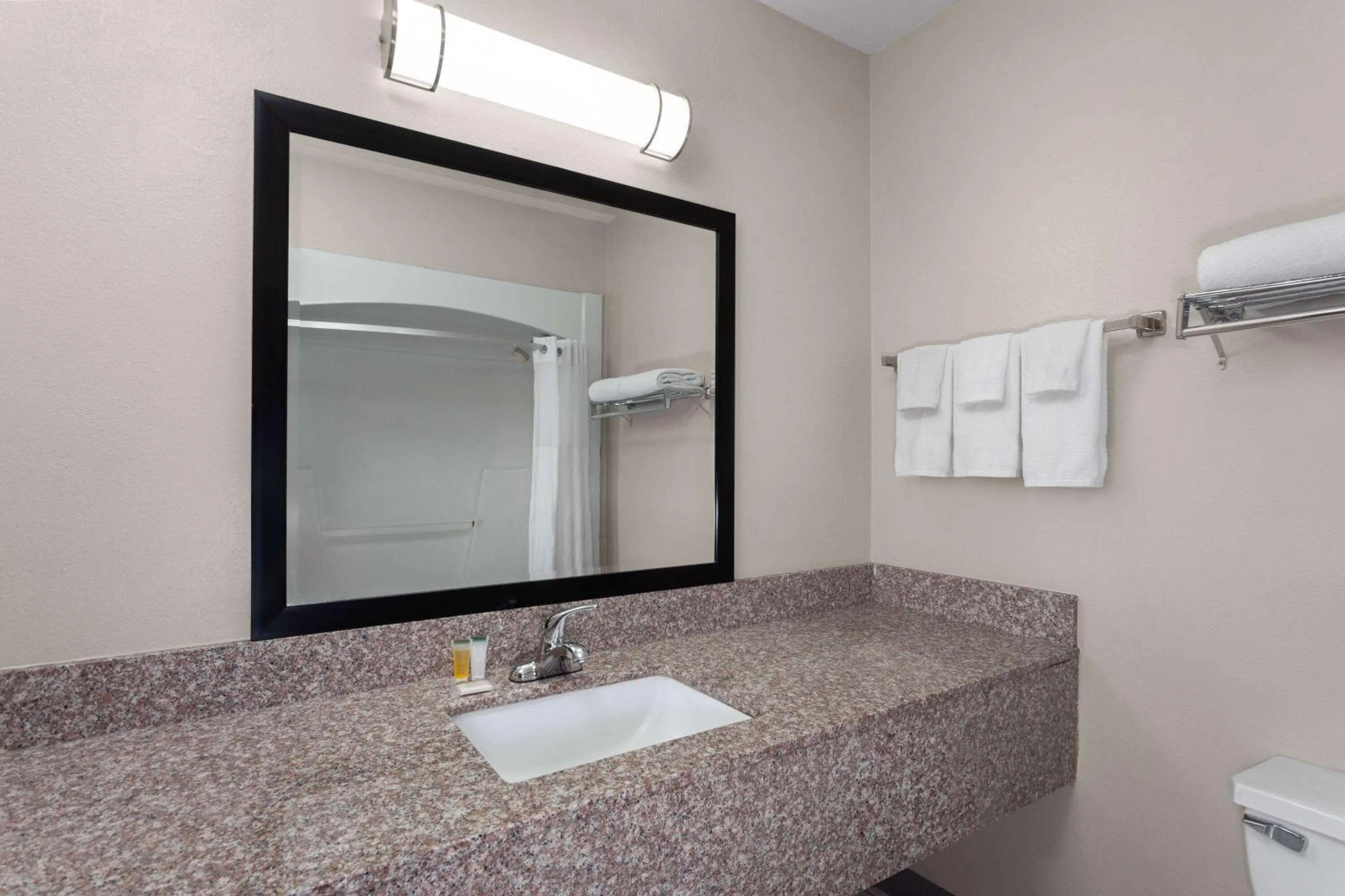 Bathroom in Days Inn & Suites by Wyndham Morris I-80