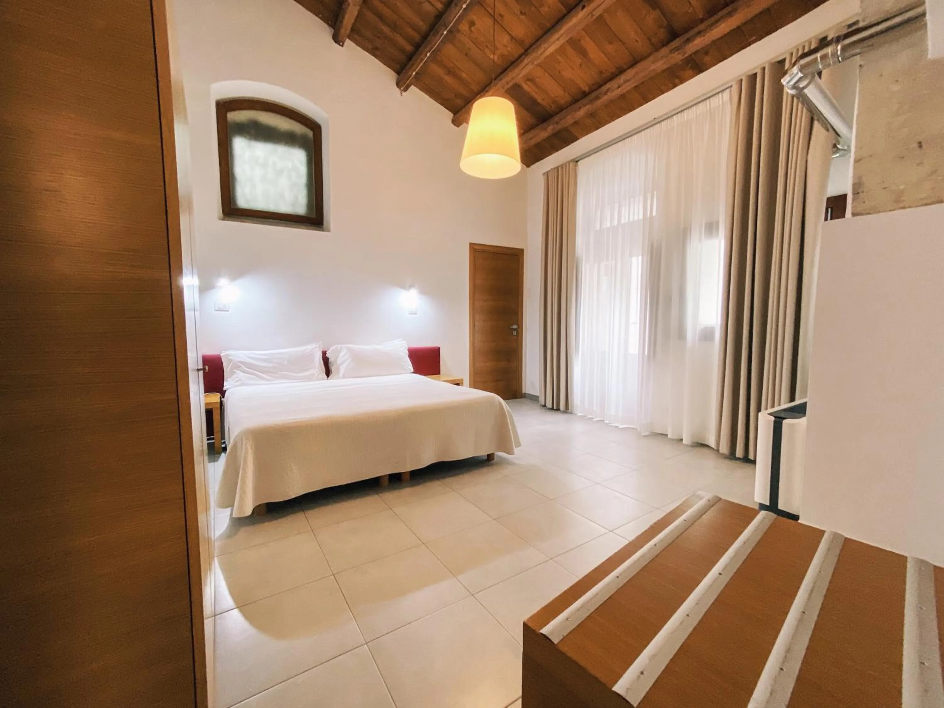 Photo of the whole room, Bed in Giardino Sul Duomo