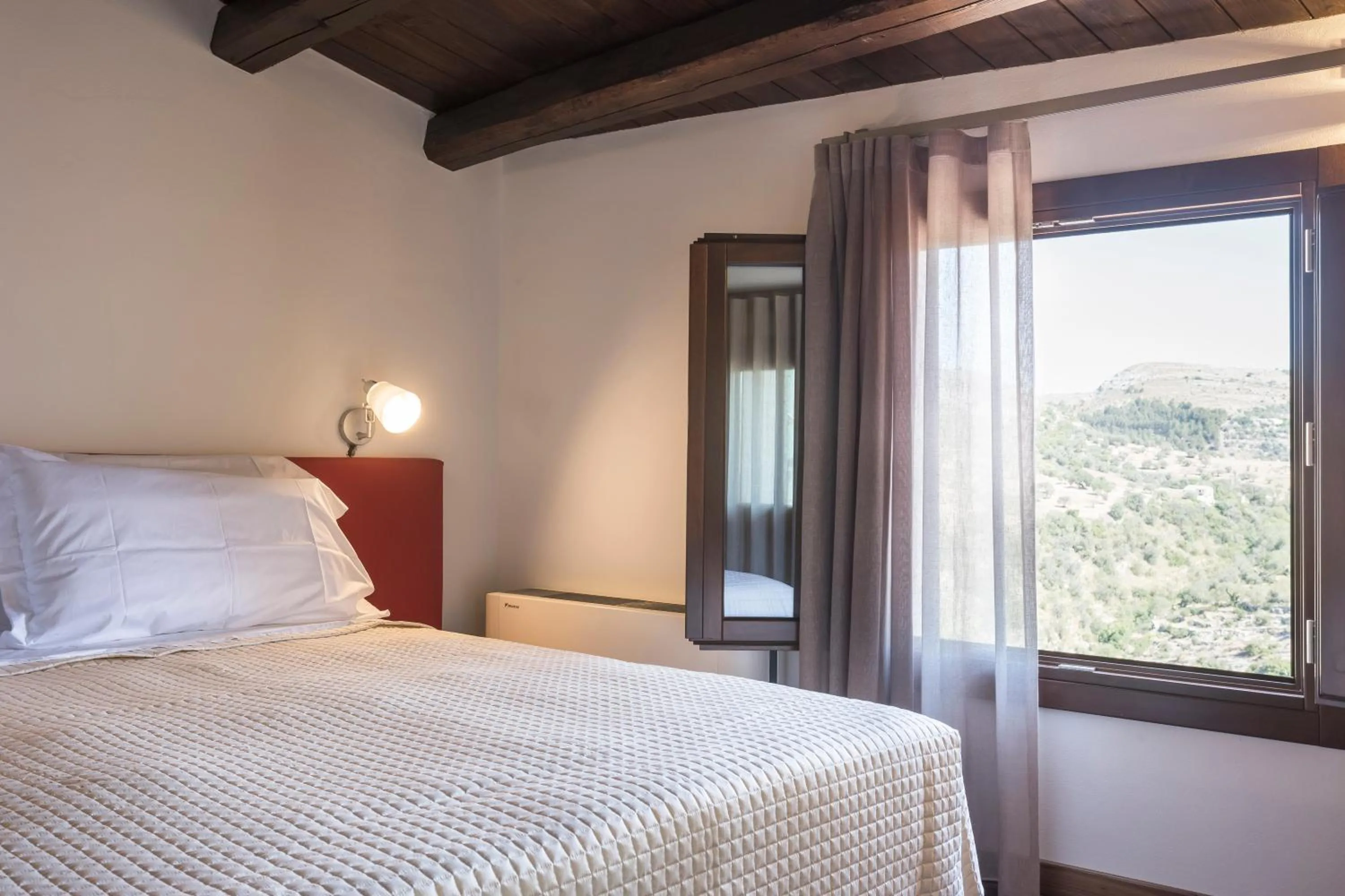 Photo of the whole room, Bed in Giardino Sul Duomo