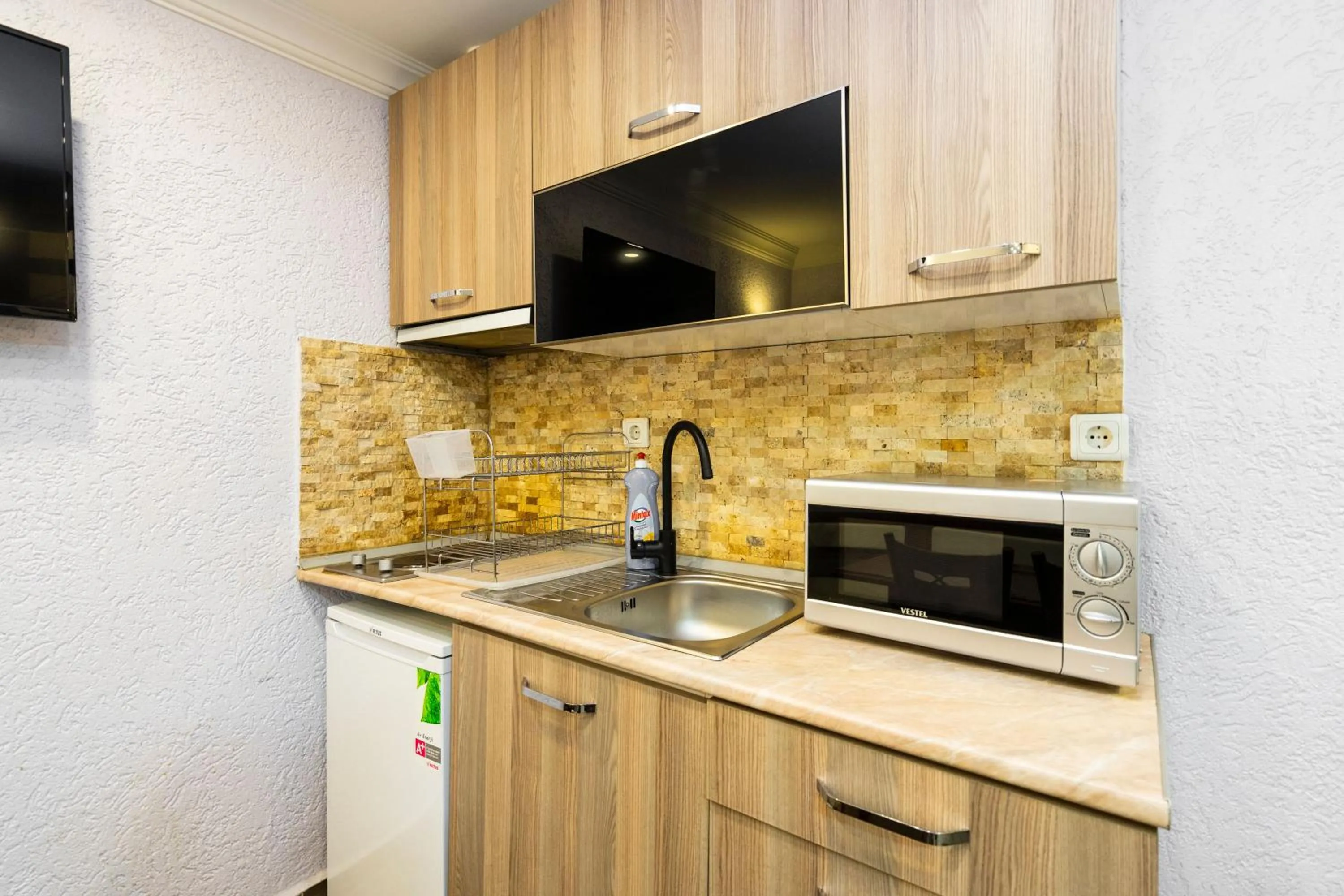 Kitchen or kitchenette in Harbour Suites Old City