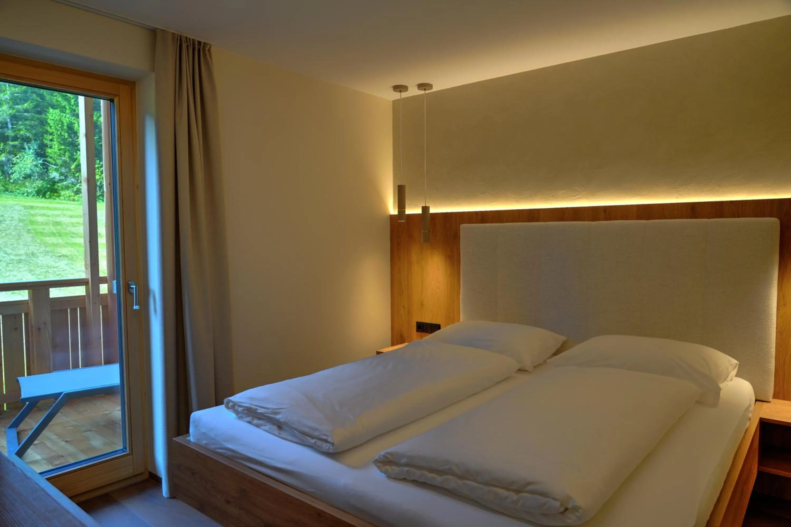 Bed in Aparthotel Iris